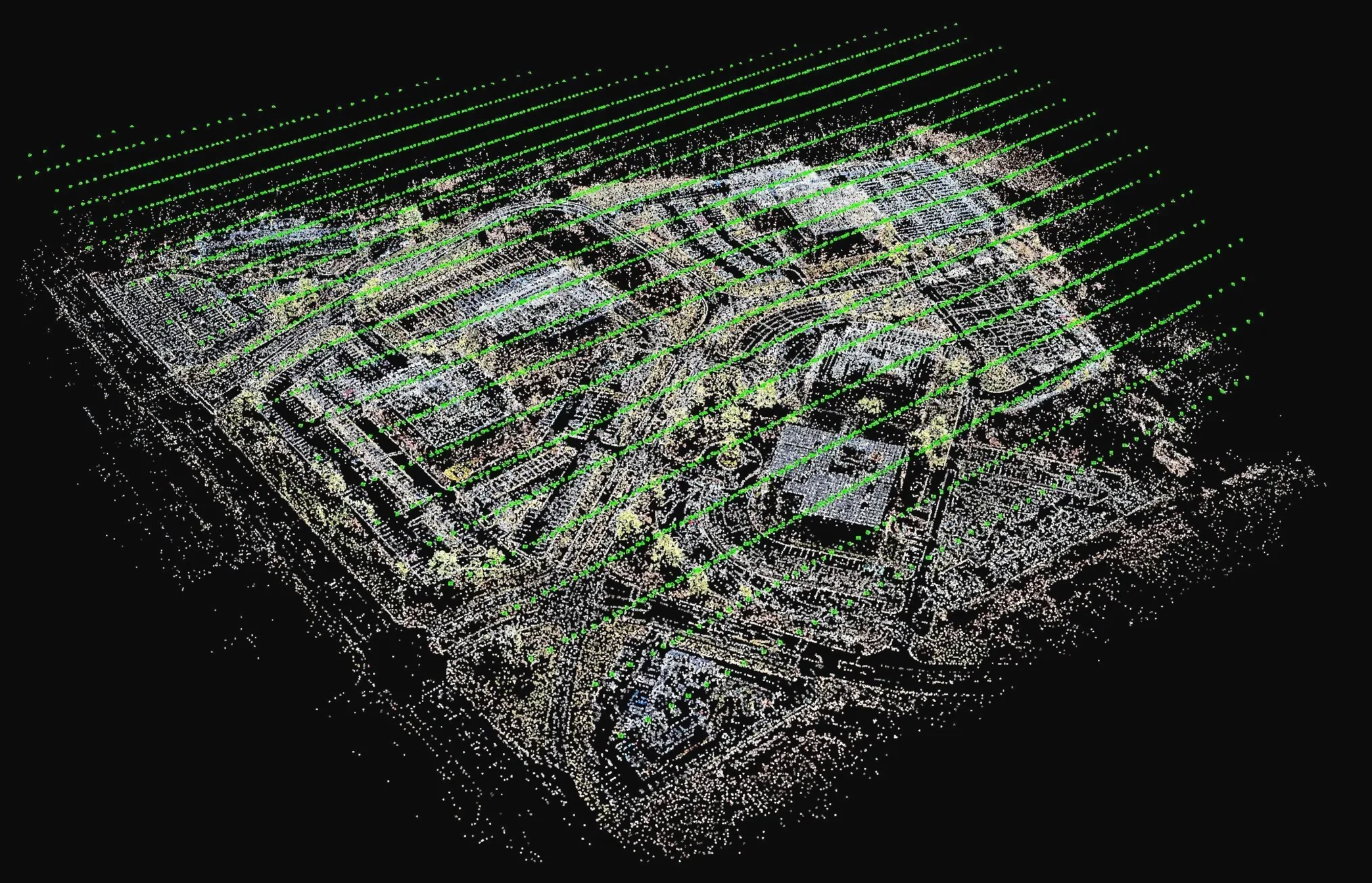 3D point cloud representation of a city block with streets and buildings, overlaid with green lines and dots.