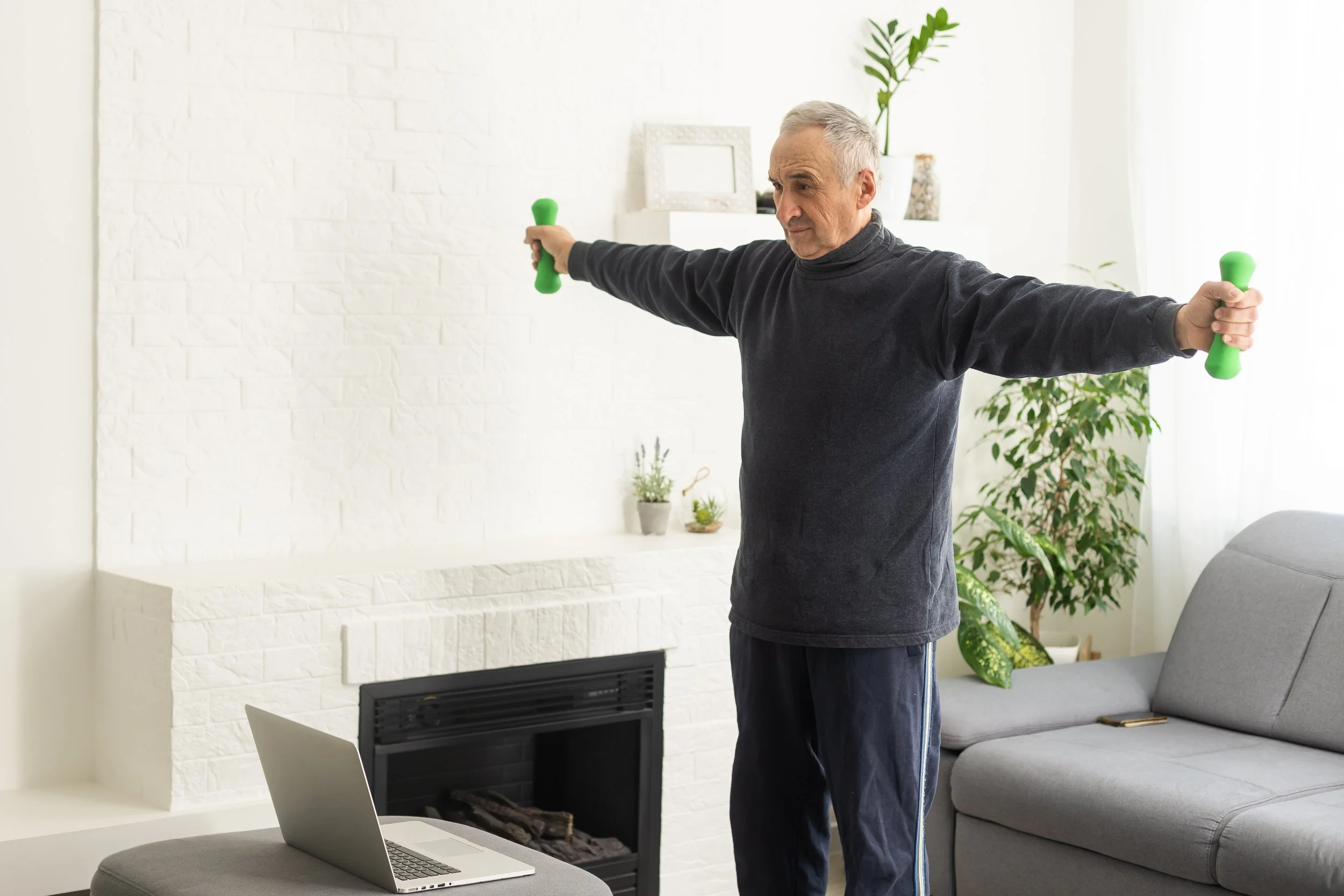 gray-haired-senior-man-doing-online-training-on-a-2023-11-27-05-17-40-utc.jpg