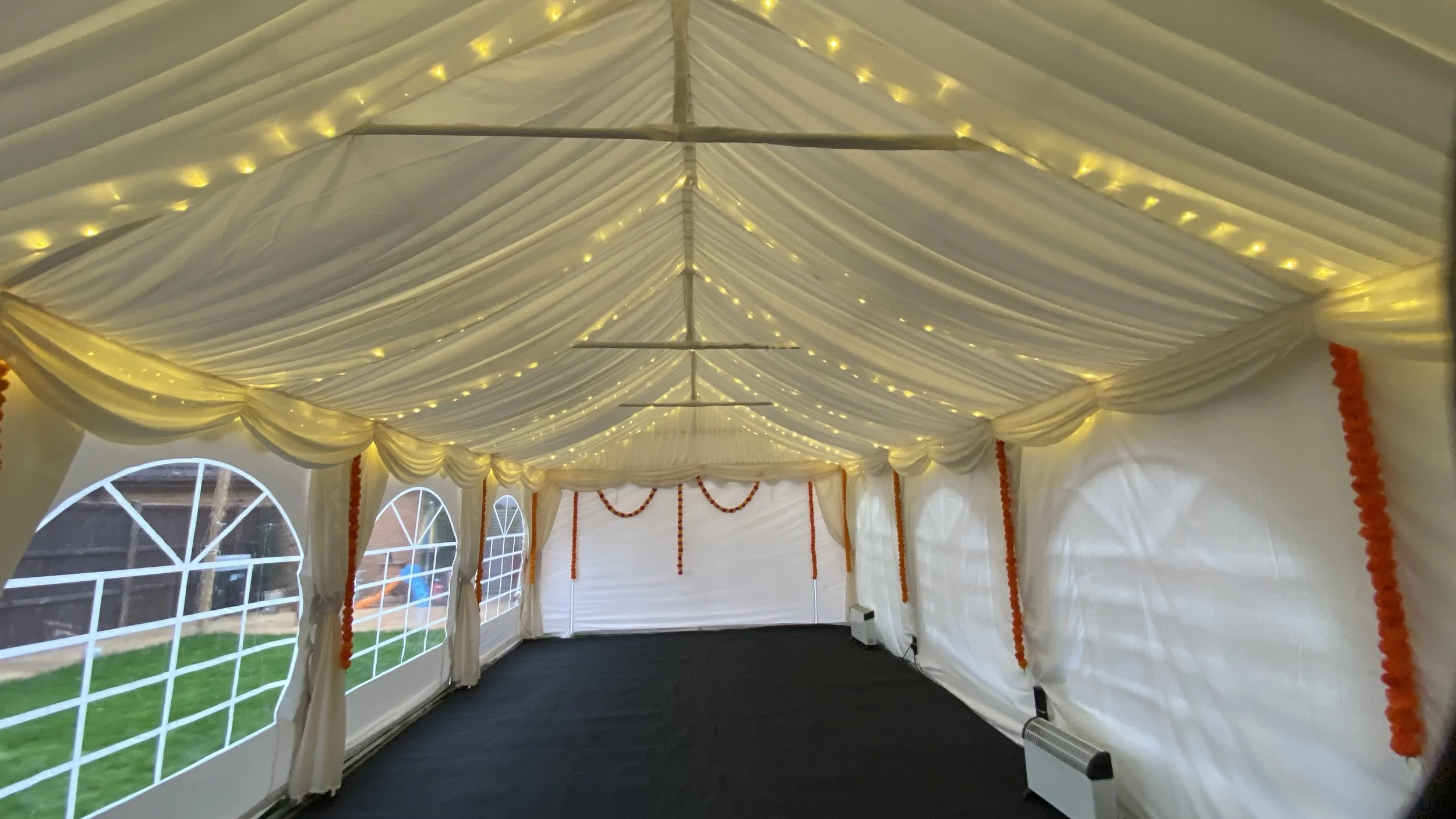 light fairy lights coloured uplights drapes garden party 3x4m frame marquee hire