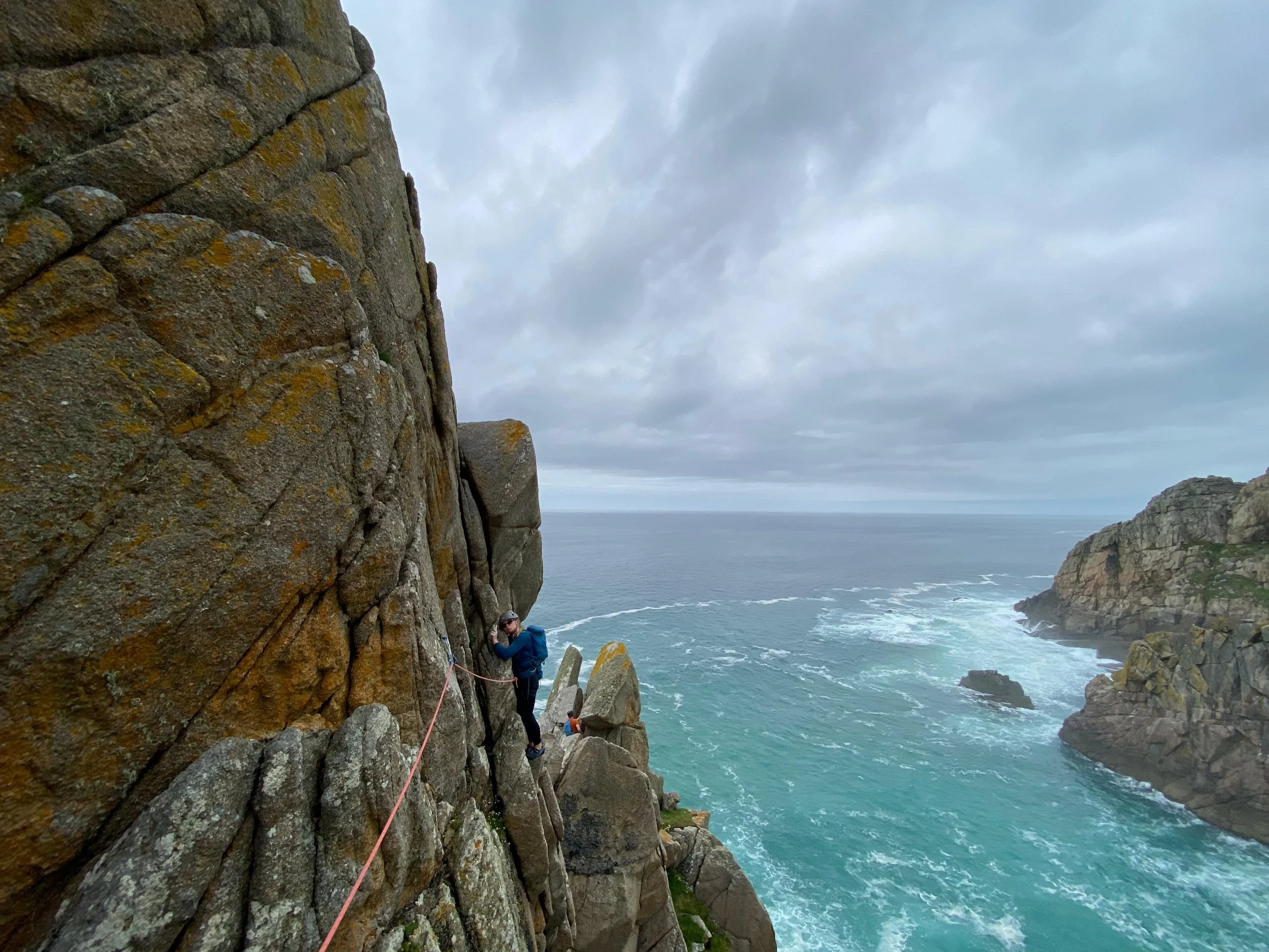 A client climbing Commando Ridge in Cornwall
