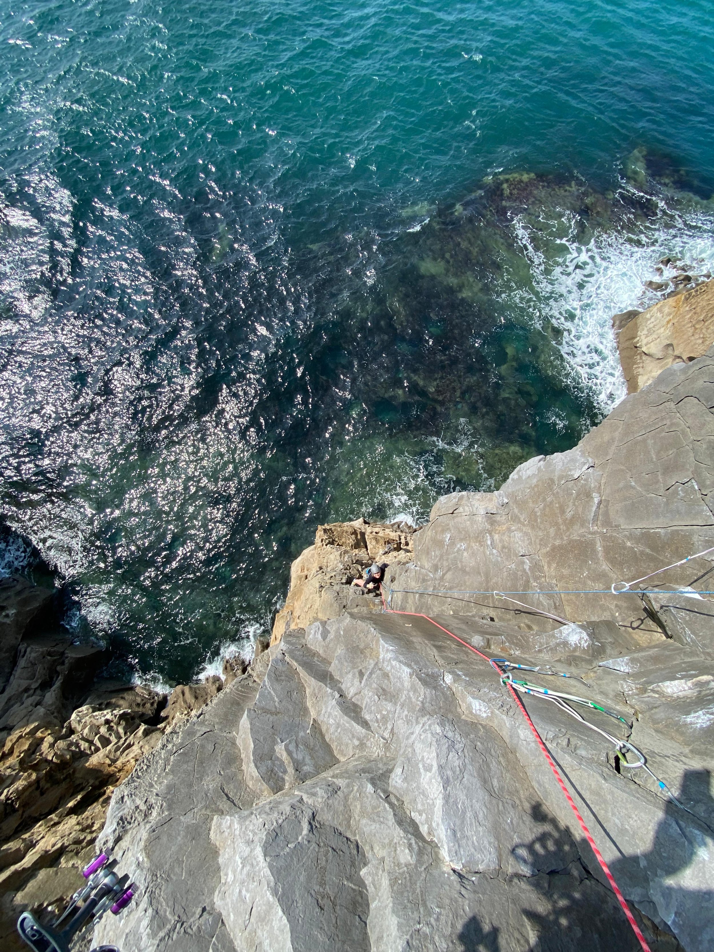 Climbing above the sea in Pembroke
