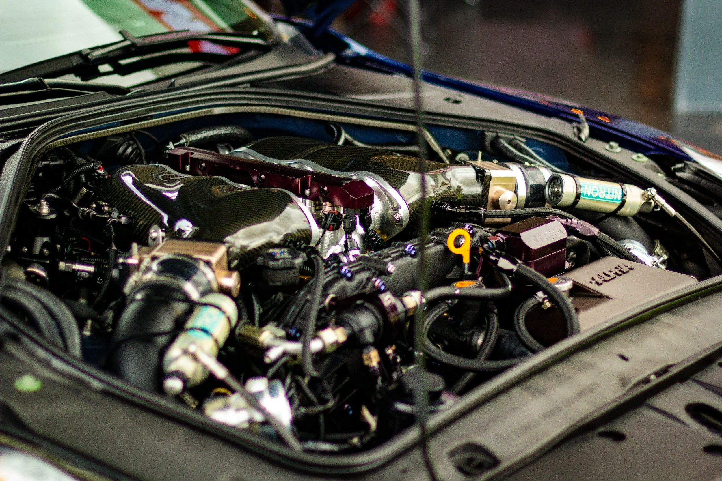 Motorraum eines Fahrzeugs – Symbolbild für technische Gutachten (Foto: Camilo Ayala / Unsplash)