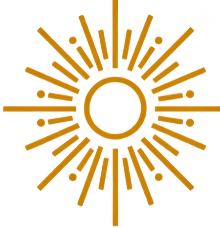 A gold and red starburst ornament with a central ring and radiating lines, hanging from a red string.