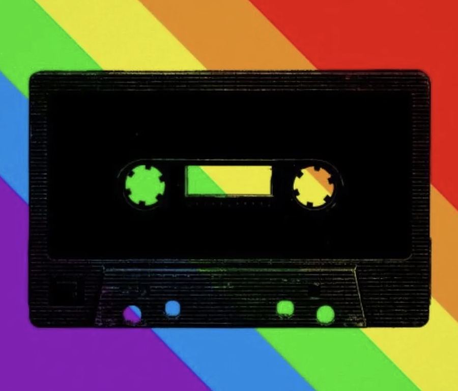 Cassette tape over a rainbow background