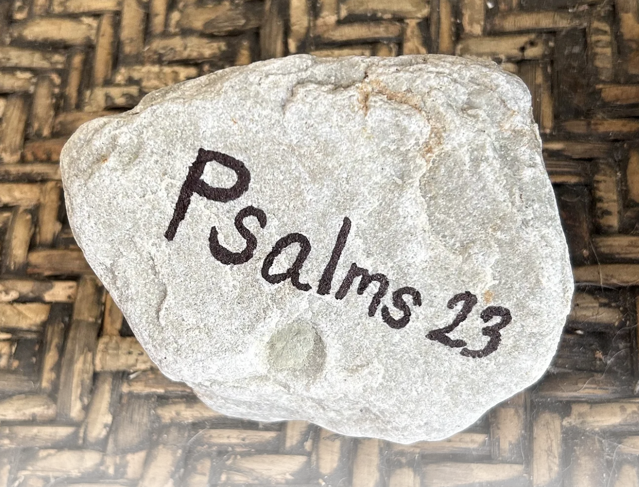 A rock with "Psalms 23" etched into it