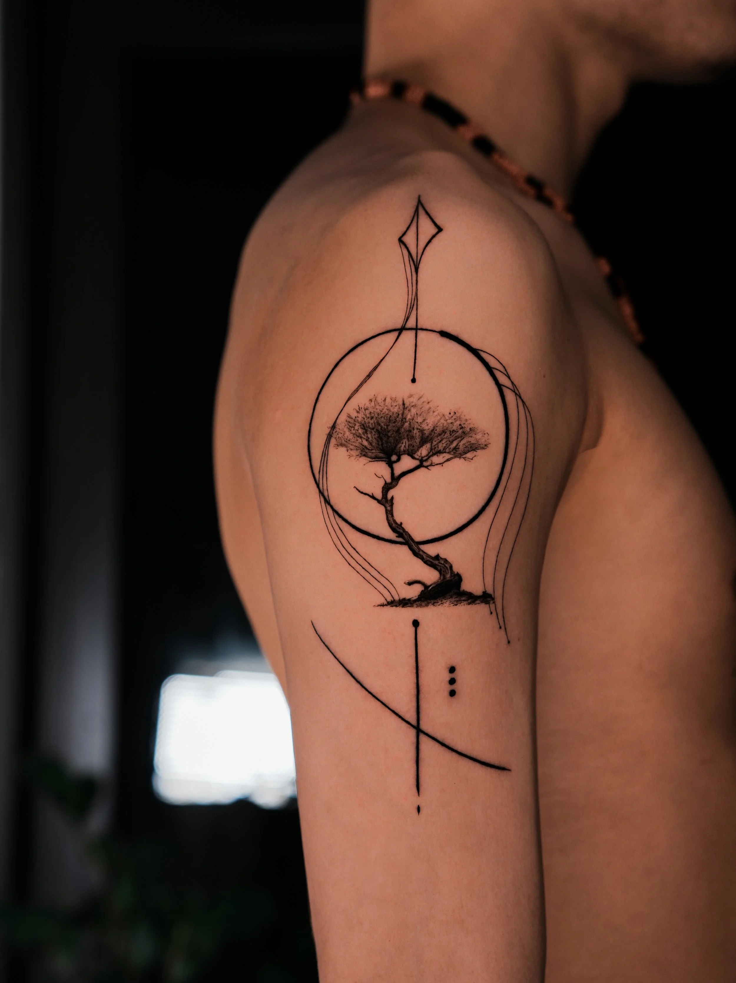 Tattoo of a bonsai with abstract lines. Done by famous tattoo artist located in Financial District of New York City - Gregory Mirzoyan @gmtattooing