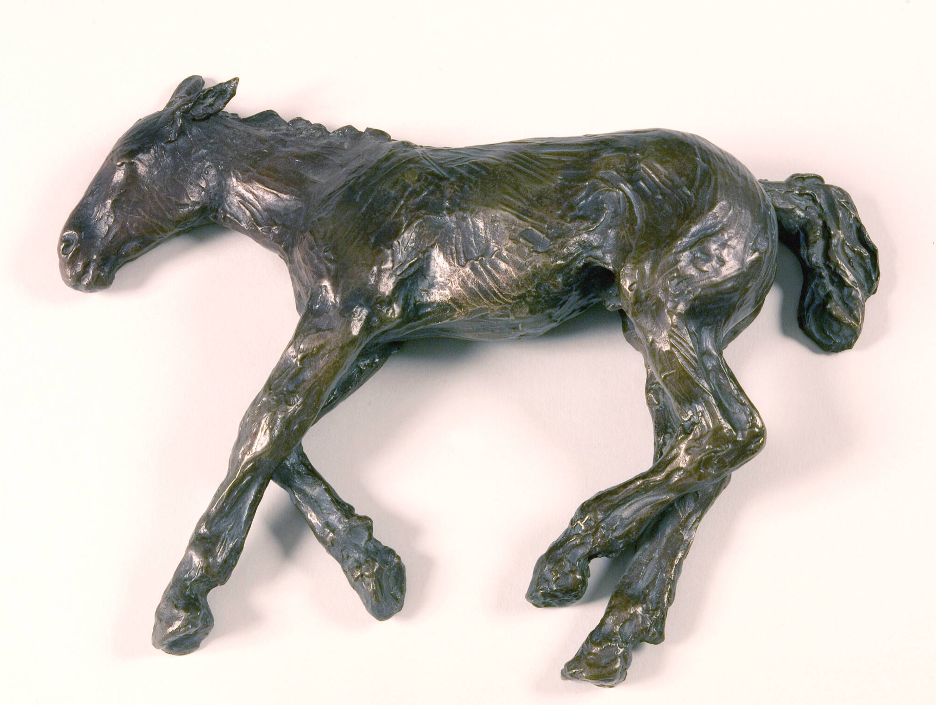 Anne Marie Carl Nielsen (1863–1945). Reclining Foal. Patinated bronze. 1937. Statens Museum for Kunst, Copenhagen.
