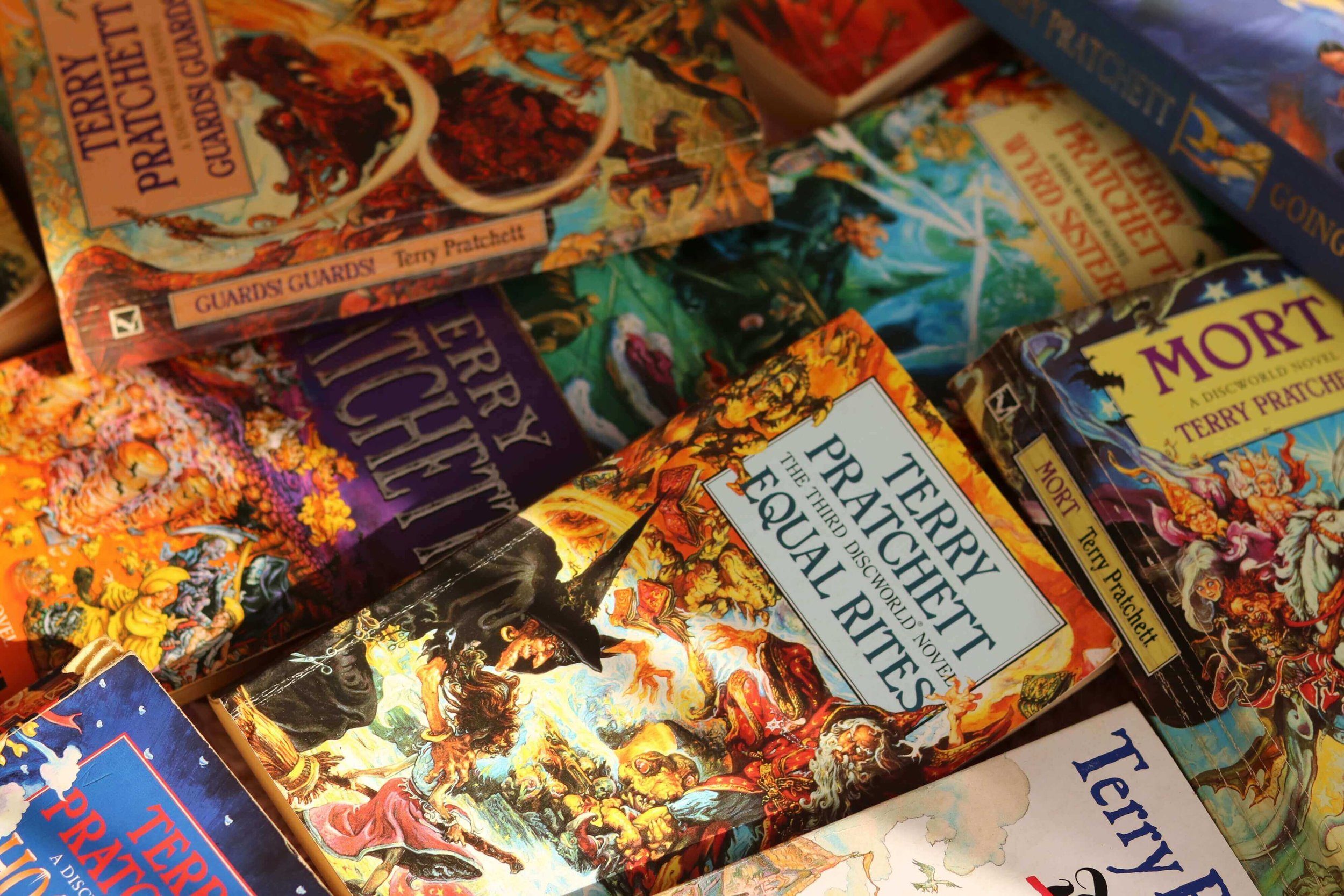 Pile of Fantasy Novels with Similar Covers