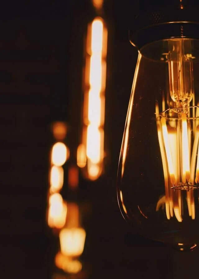 Antique bulb in atmospheric street lamp
