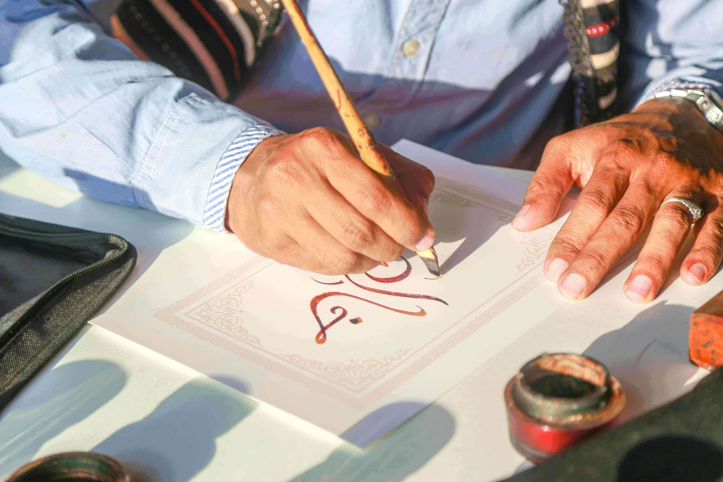 handpainted calligraphy artist studio