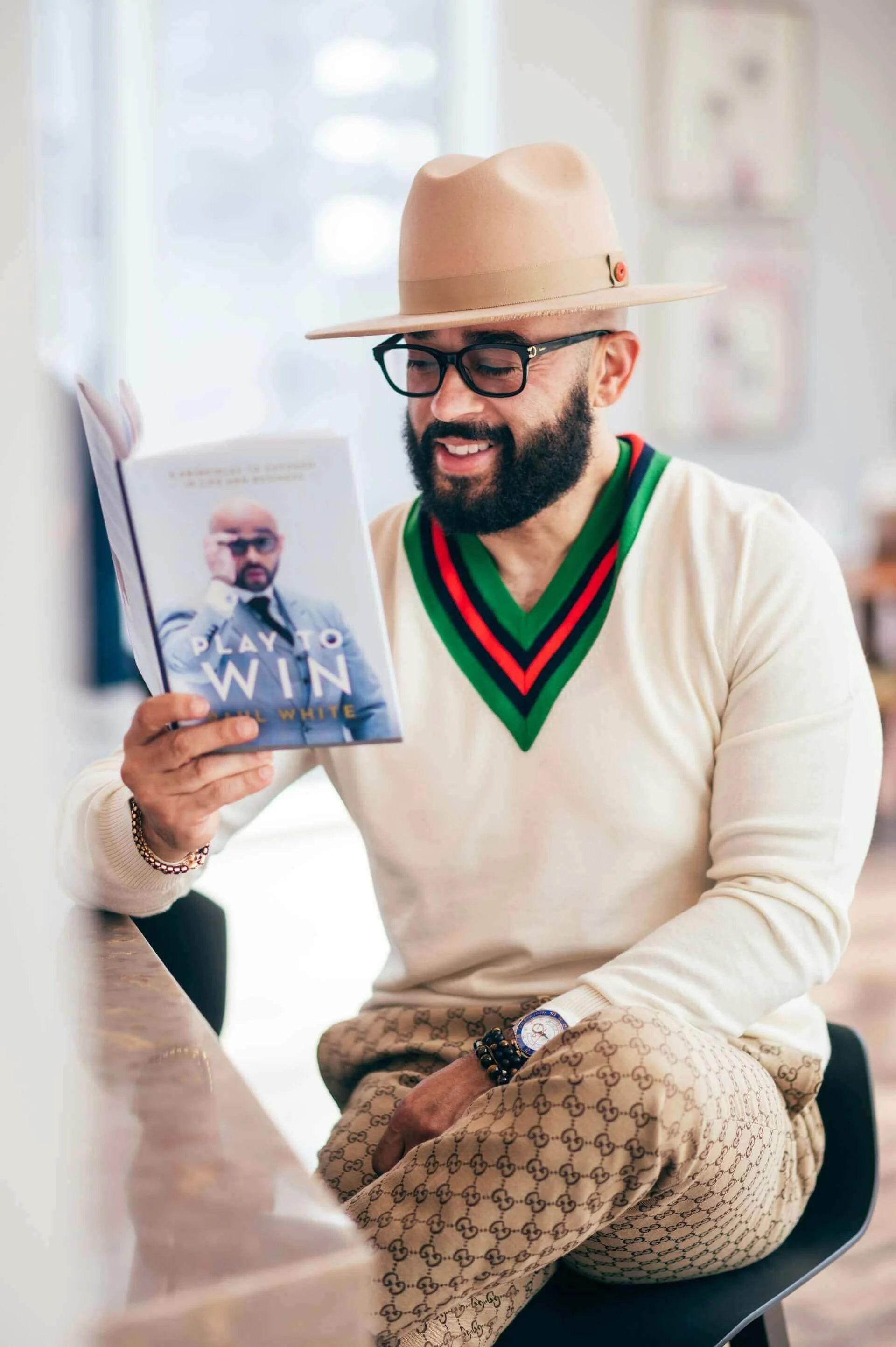 Happy, ambitous reader with play to win novel