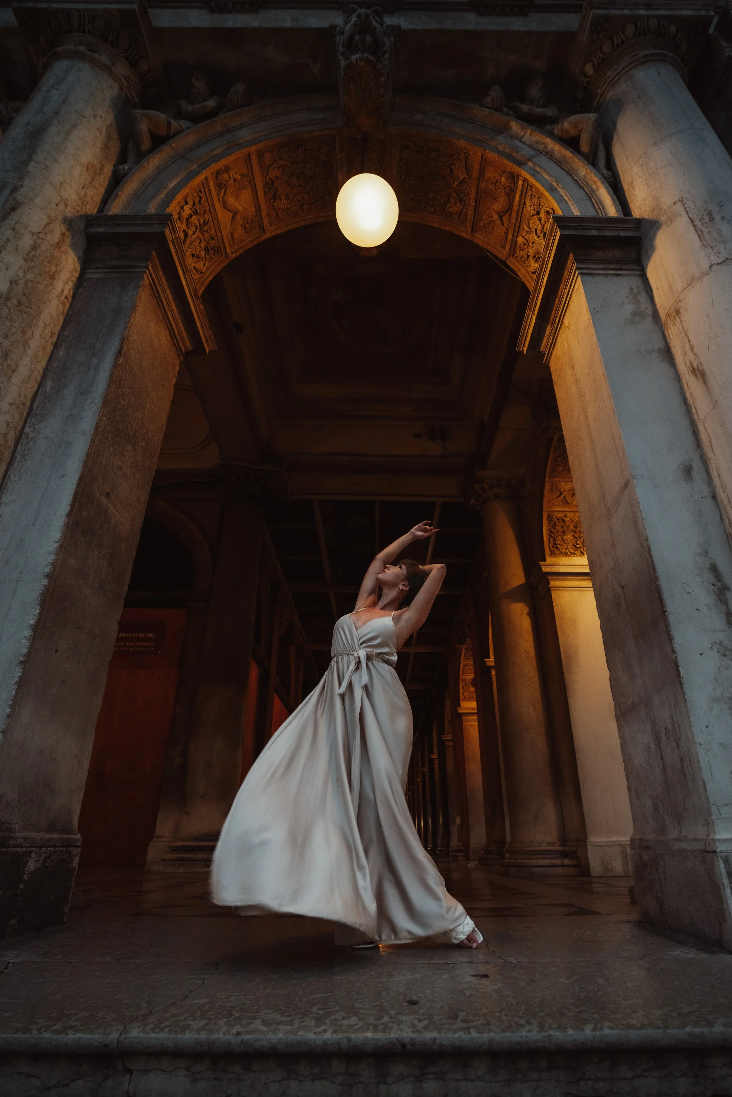 young-woman-under-the-light-2024-11-26-10-59-23-utc (1).jpg