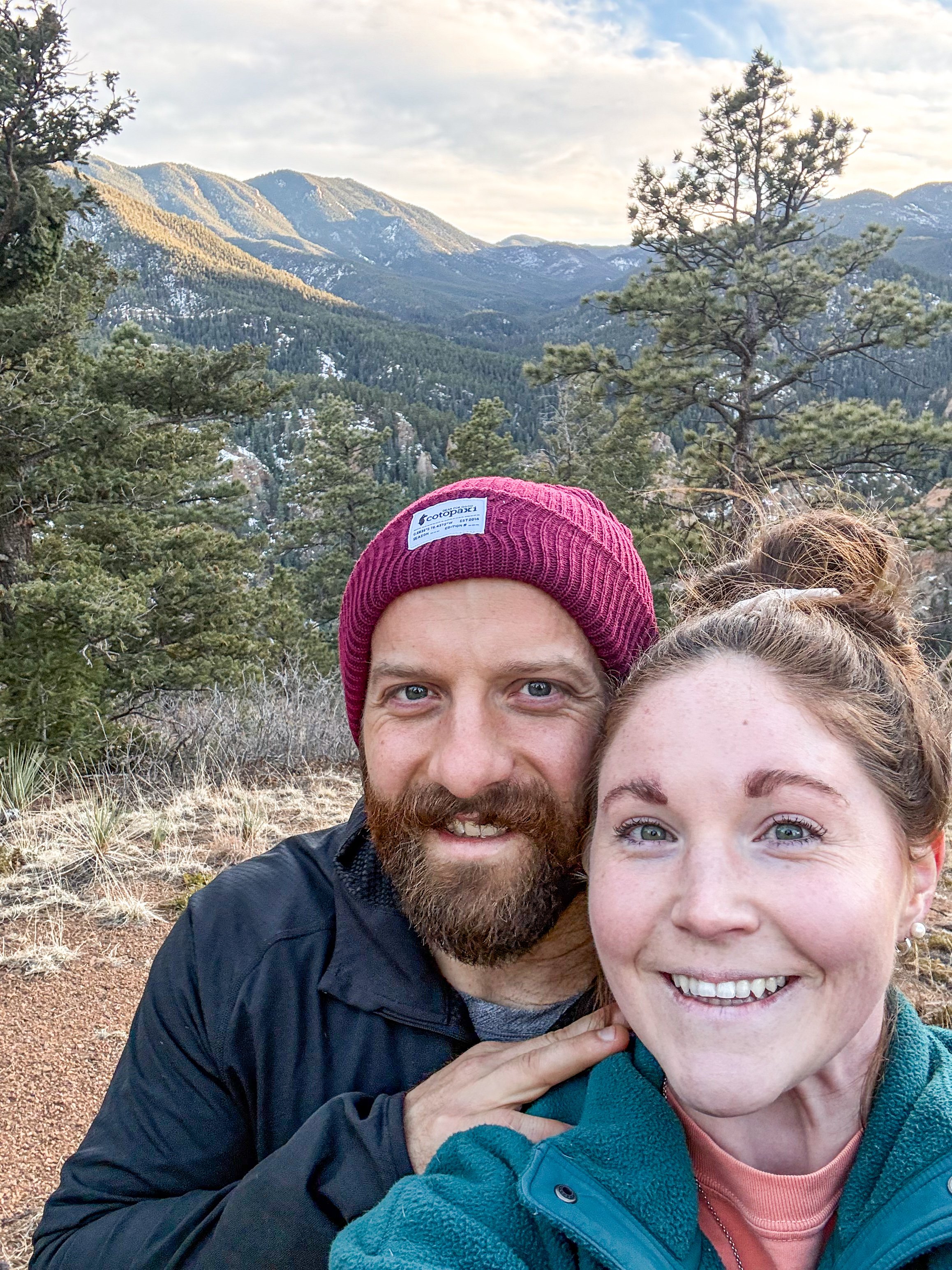 fitness couple hiking in colorado
