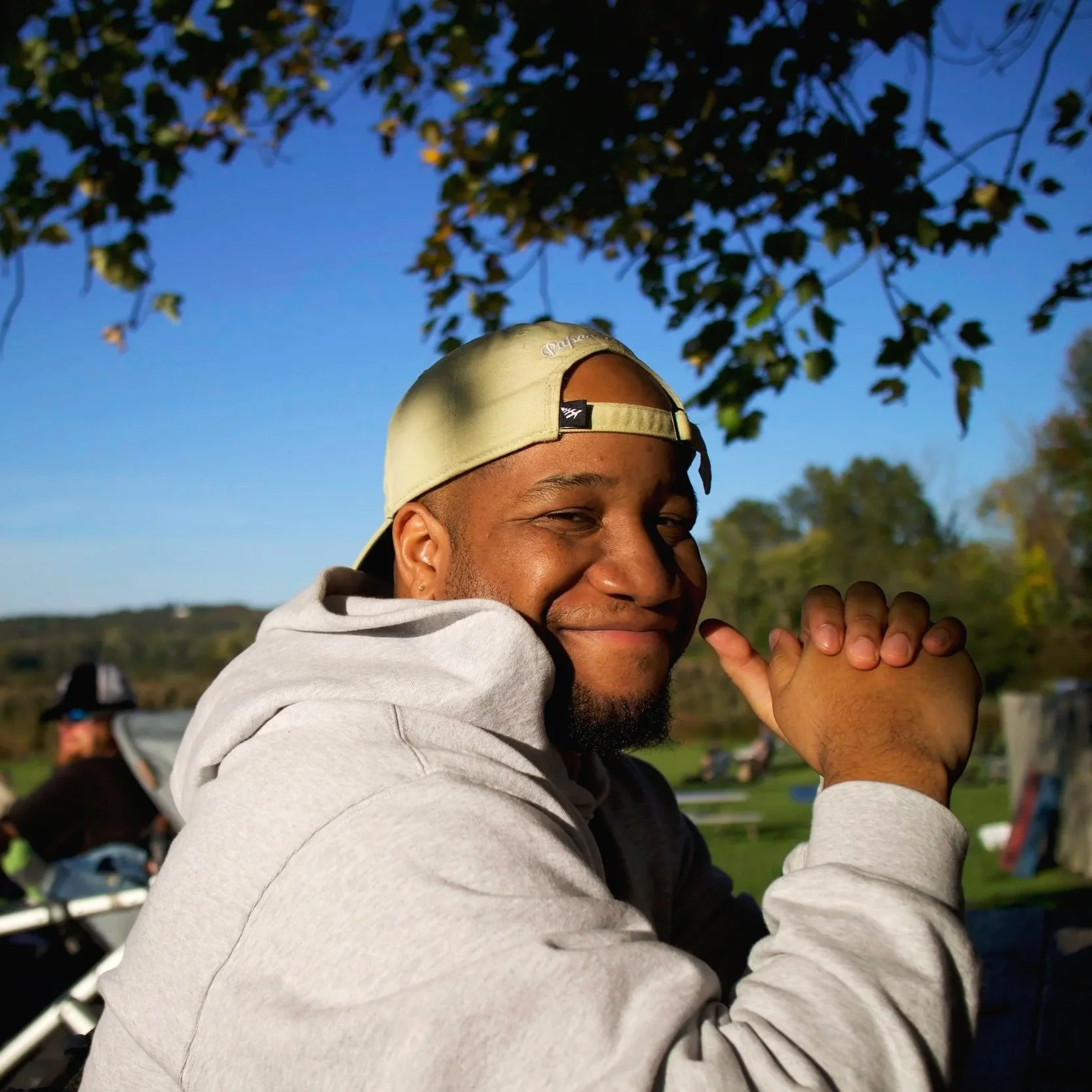 a photo of Burton Lewis Jr. with his signature smile