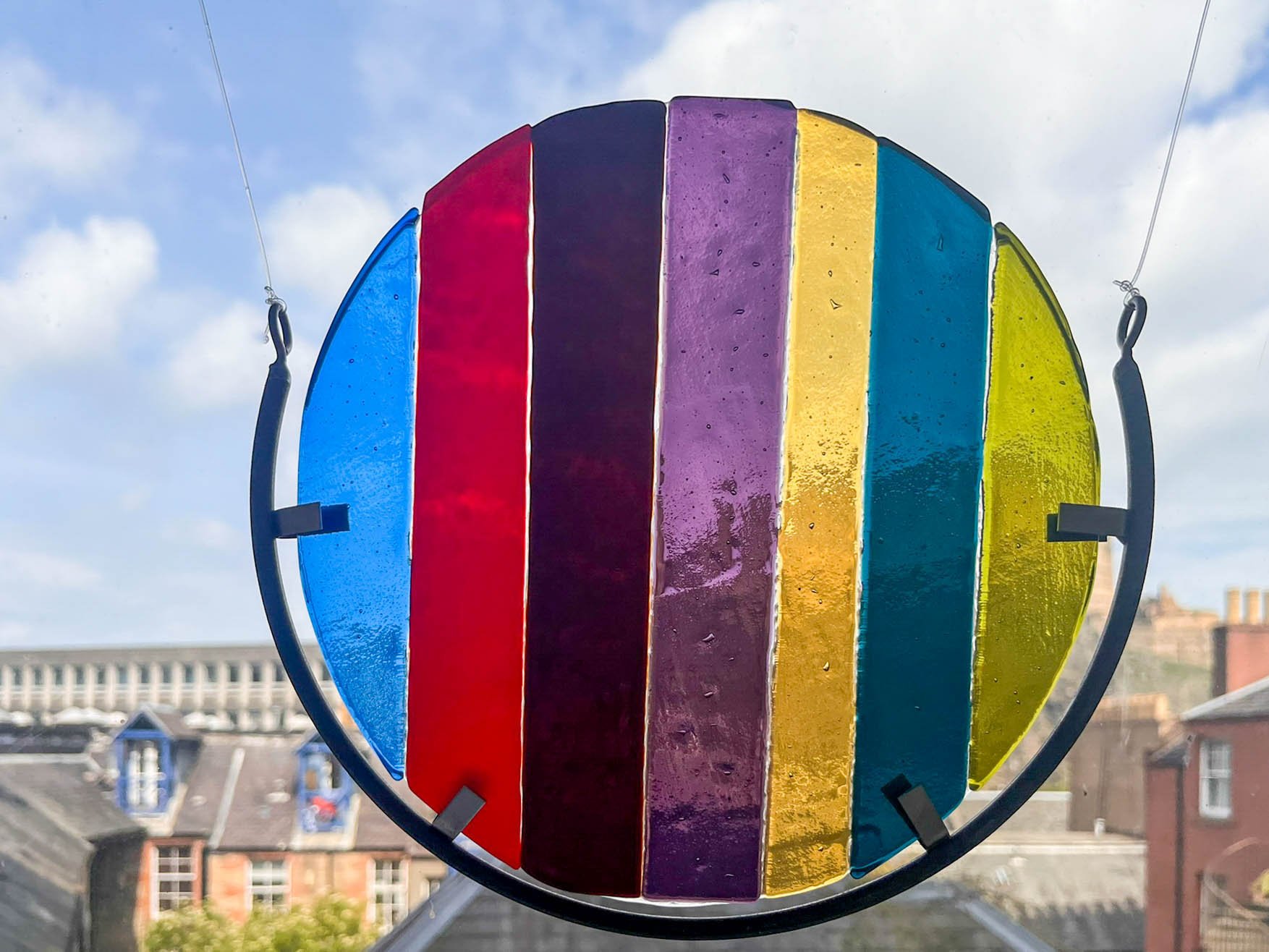 fused glass in metal frames (24 cm diameter each)