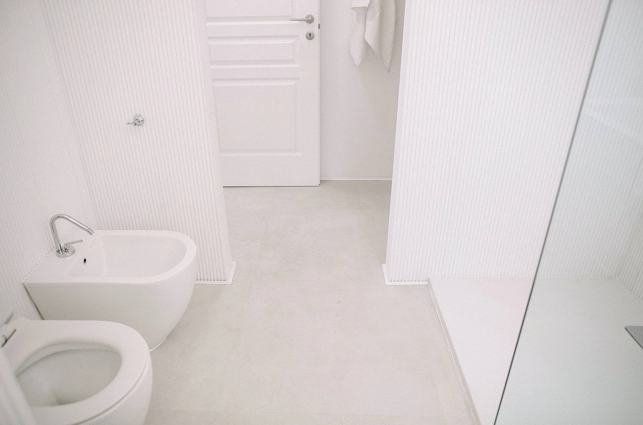 Minimal bathroom space in quiet apartment in central Milan