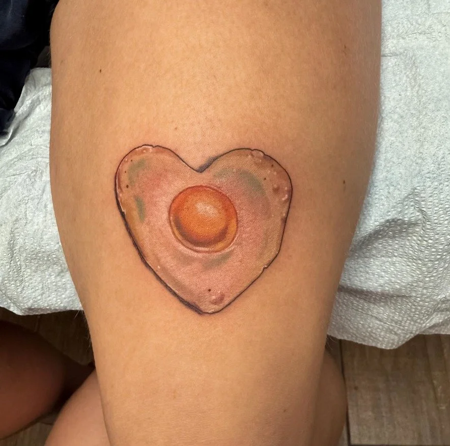 egg
.
done by Mo @some.mo.art 
.
#realismtattoo #riseandshineitsbreakfasttime #friedegg