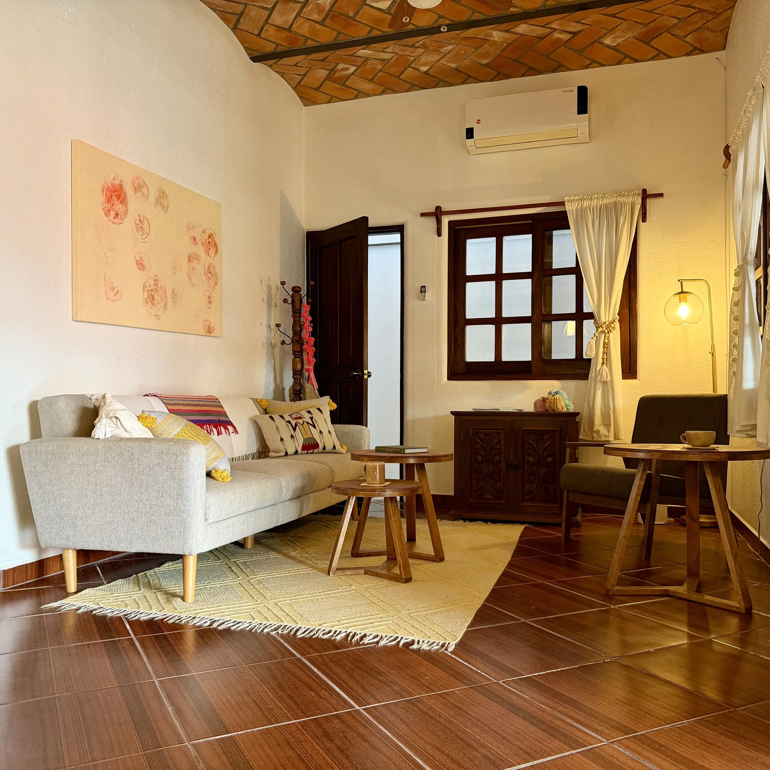 House Living Room leading to exterior hallway to courtyard.jpeg