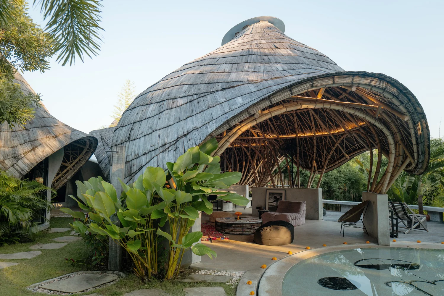 Sculptural bamboo villa and tropical garden at Bandido Bali