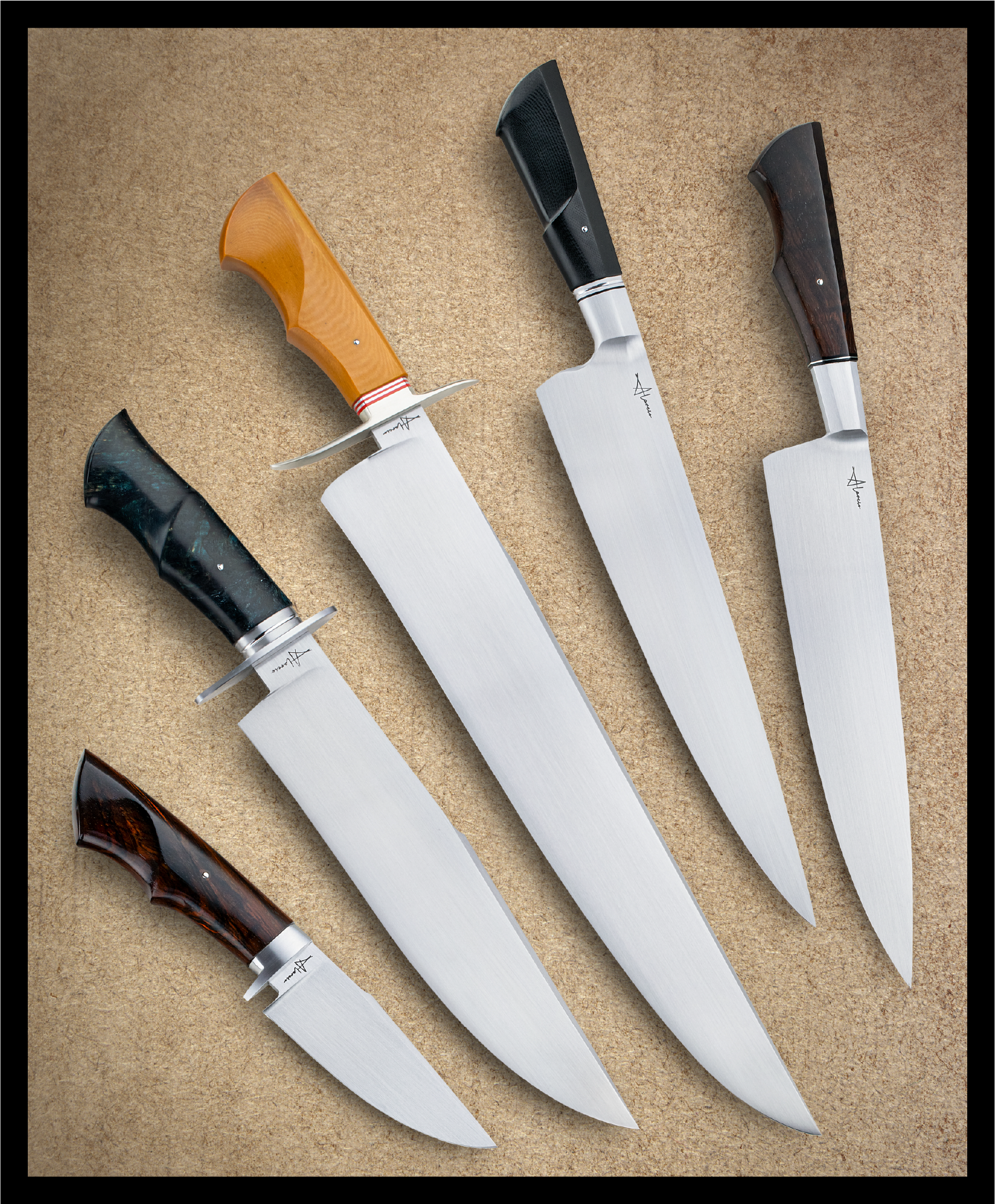 Set of 5 Journeyman Smith knives, displayed in a fan shape on a light background. There are two hunting knives, a machete, and two chef's knives