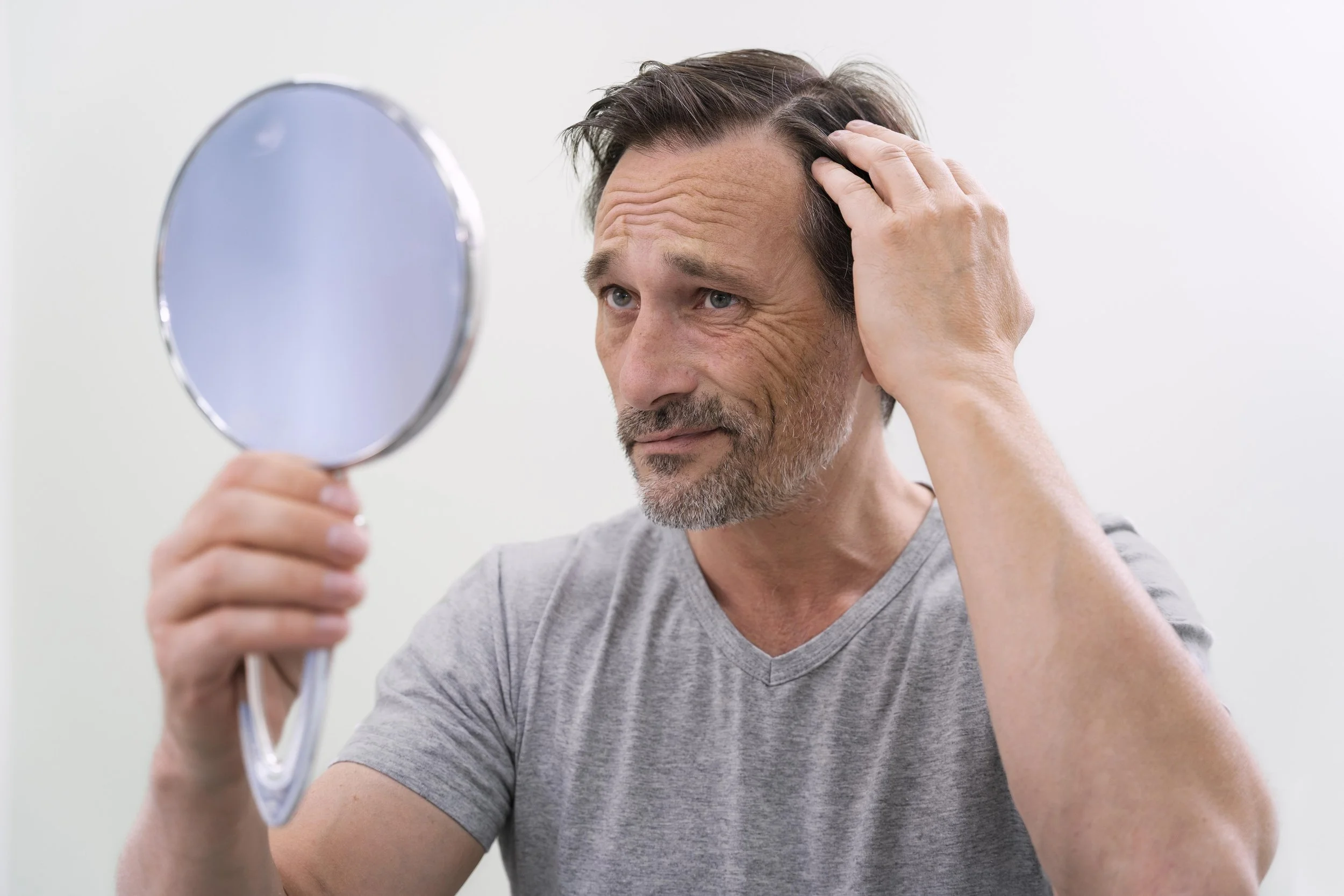 man-getting-hair-loss-treatment.jpg