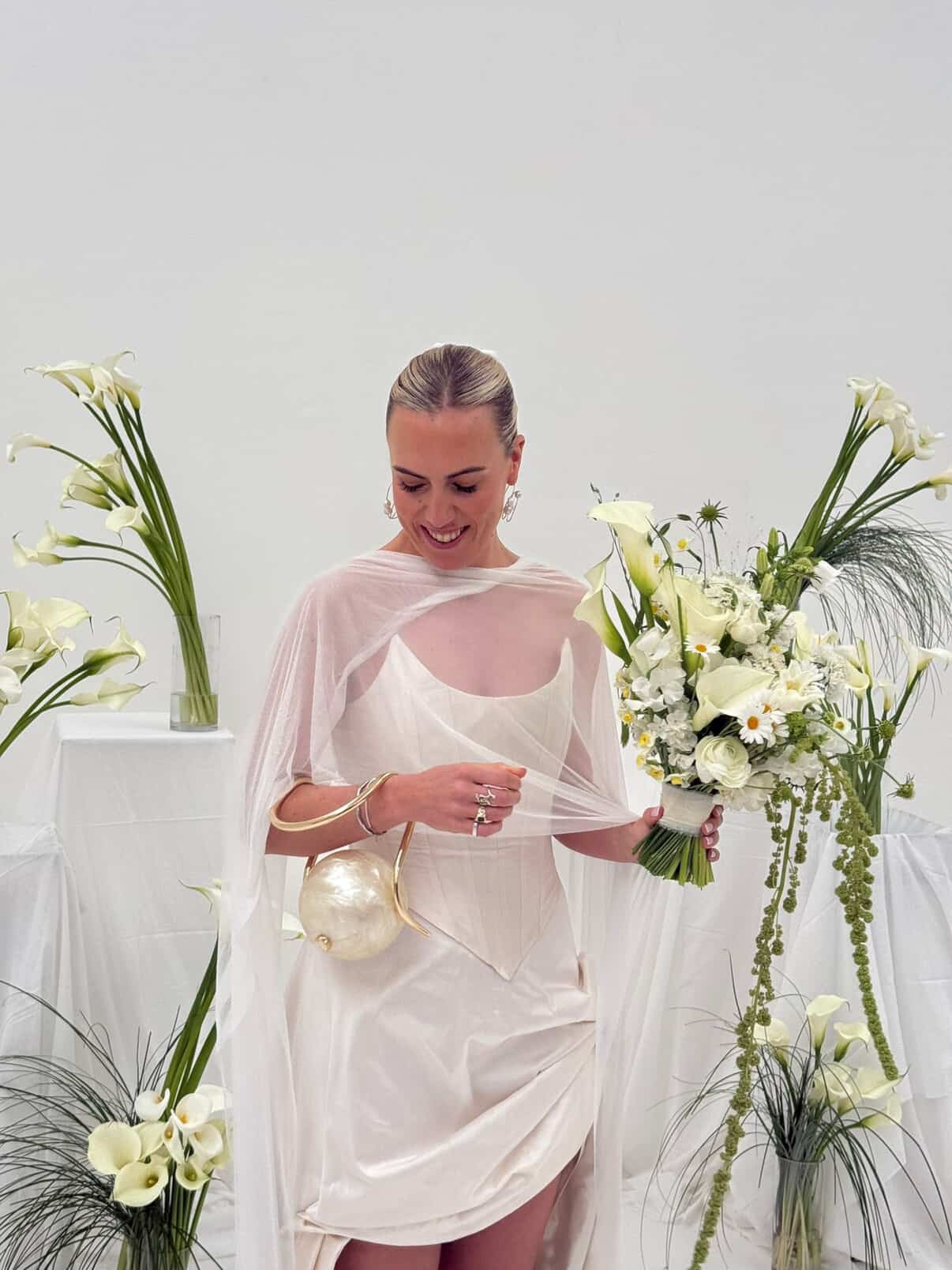 Real Bride wears Bespoke Emily Butler wedding separates & cape. Designed & made in Liverpool contemporary bridal studio for the modern, fashion bride