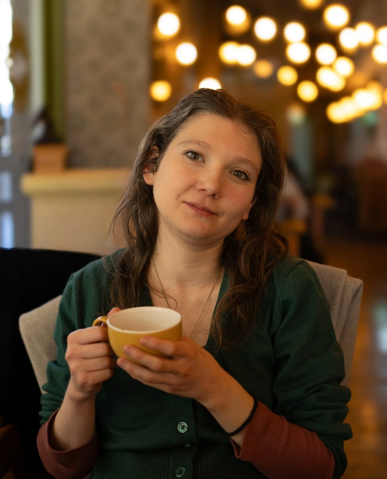Photo of woman in coffee shop