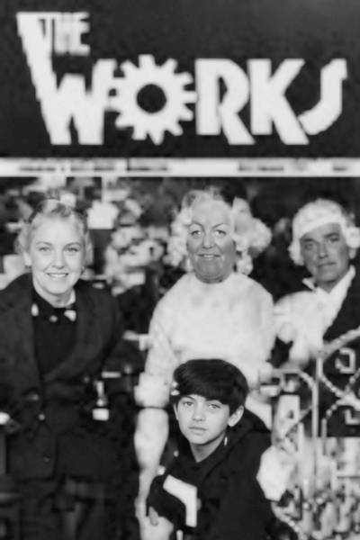 Black-and-white 1970s cover of The Works magazine featuring community members gathered beneath a large “The Works” sign, highlighting the club’s early LGBTQ history.