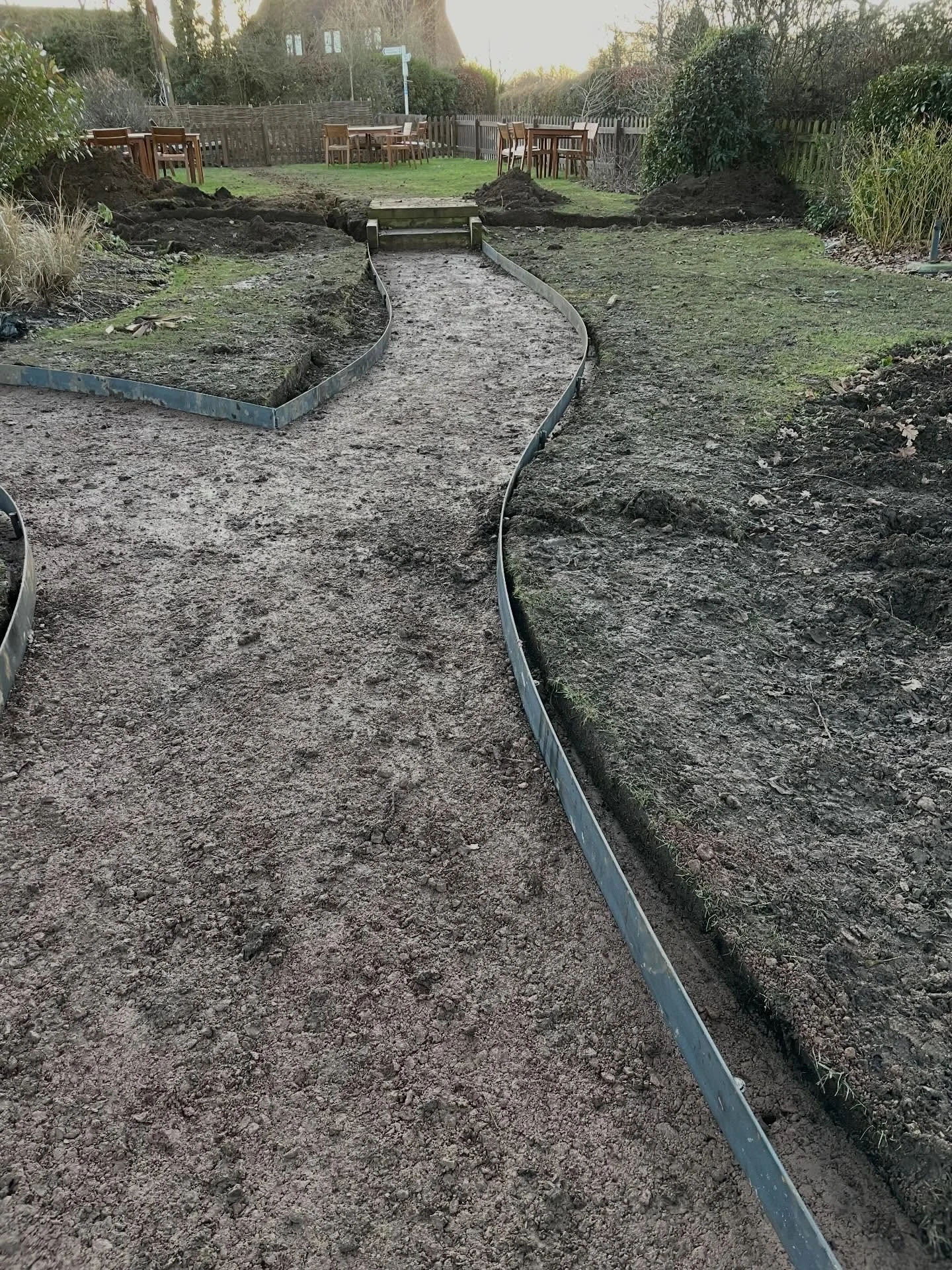 Today was a day of curves! 

Setting out our garden design with the contractor is one of the most important steps in bringing a design to reality.  We always like to sign this off personally so we can assure our clients that the bones of a garden are