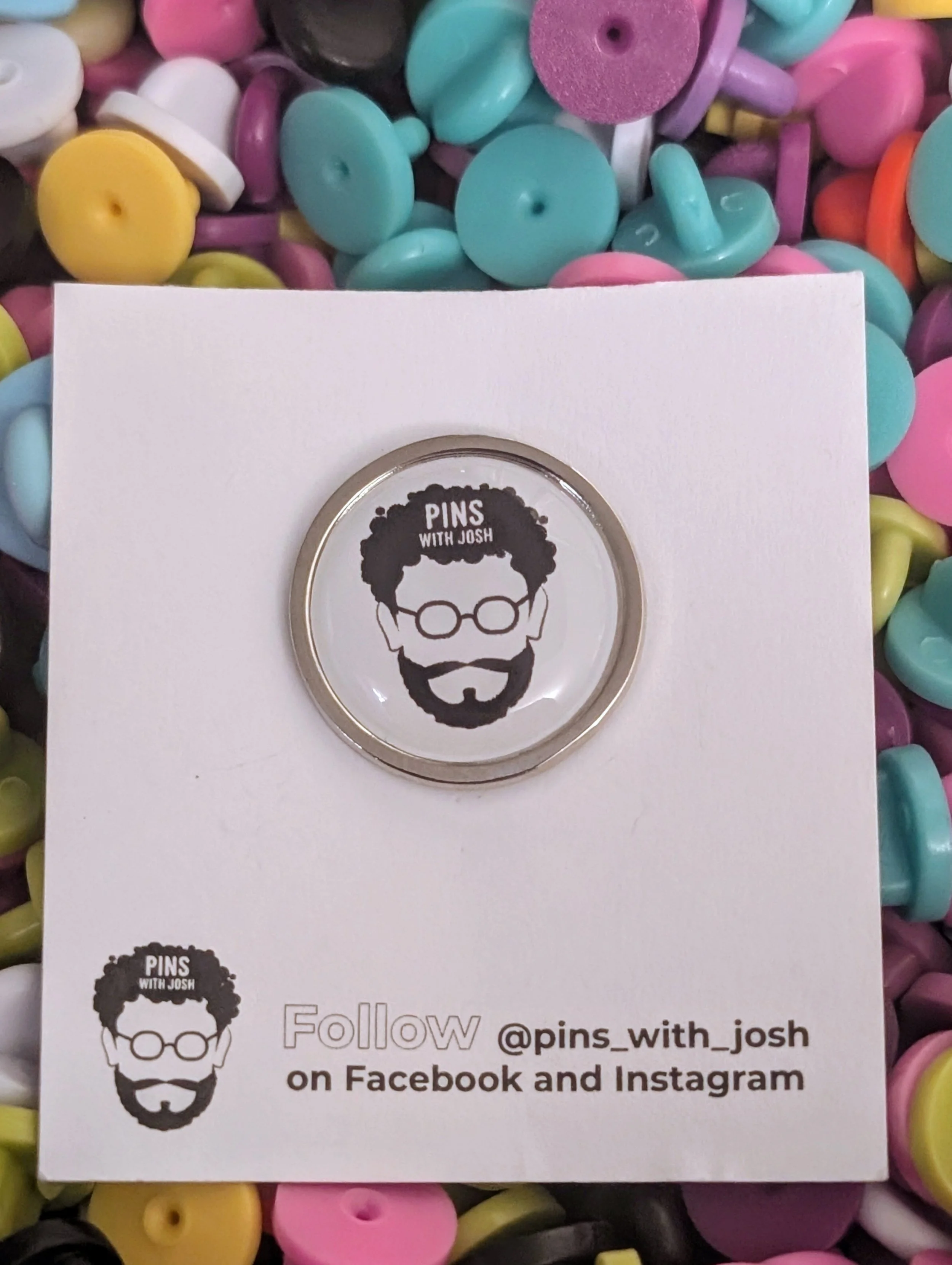 White PWJ pin badge - £2