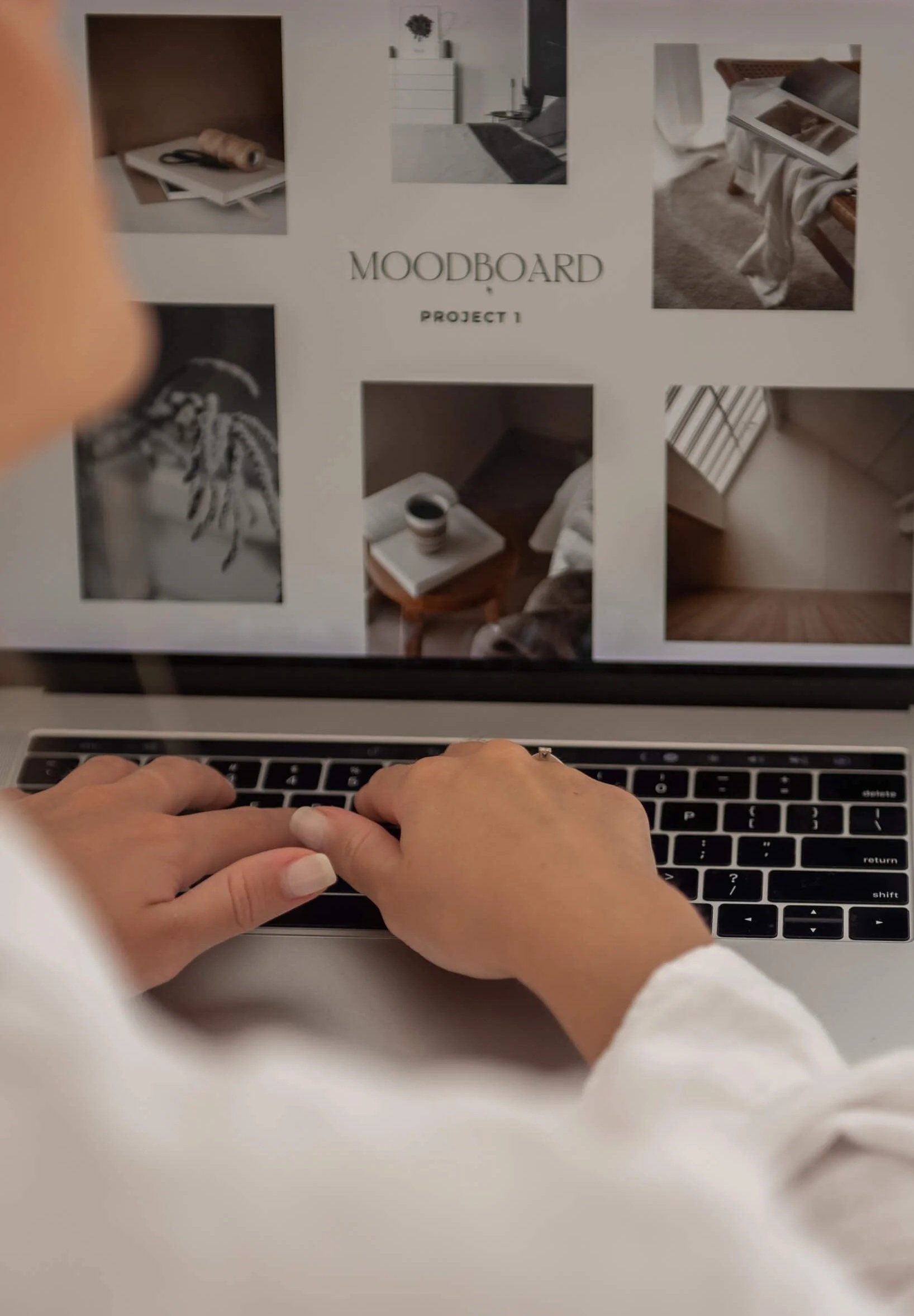A moodboard creating web designer using a laptop
