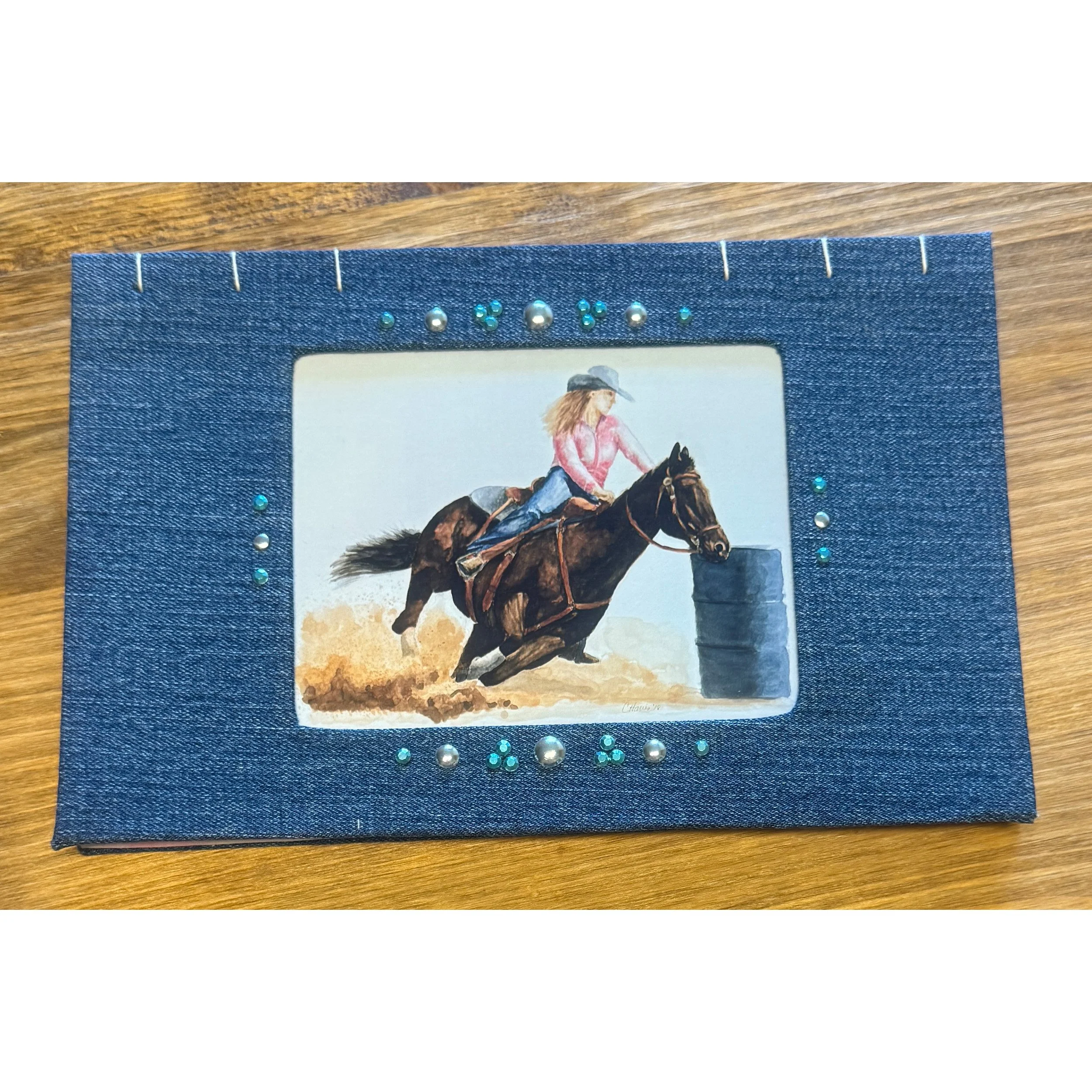 Handmade journal made with denim and an girl barrel race by Studio Rags.