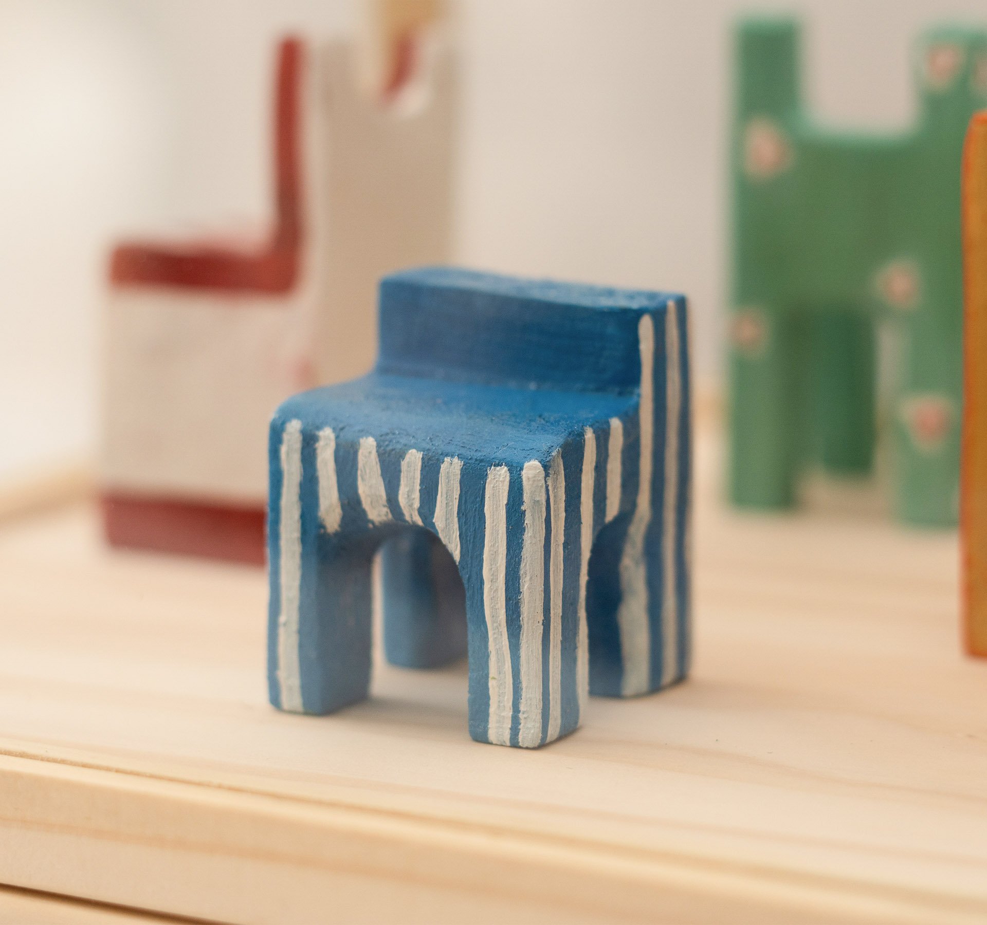 blue-chair-carved-in-wood.jpg