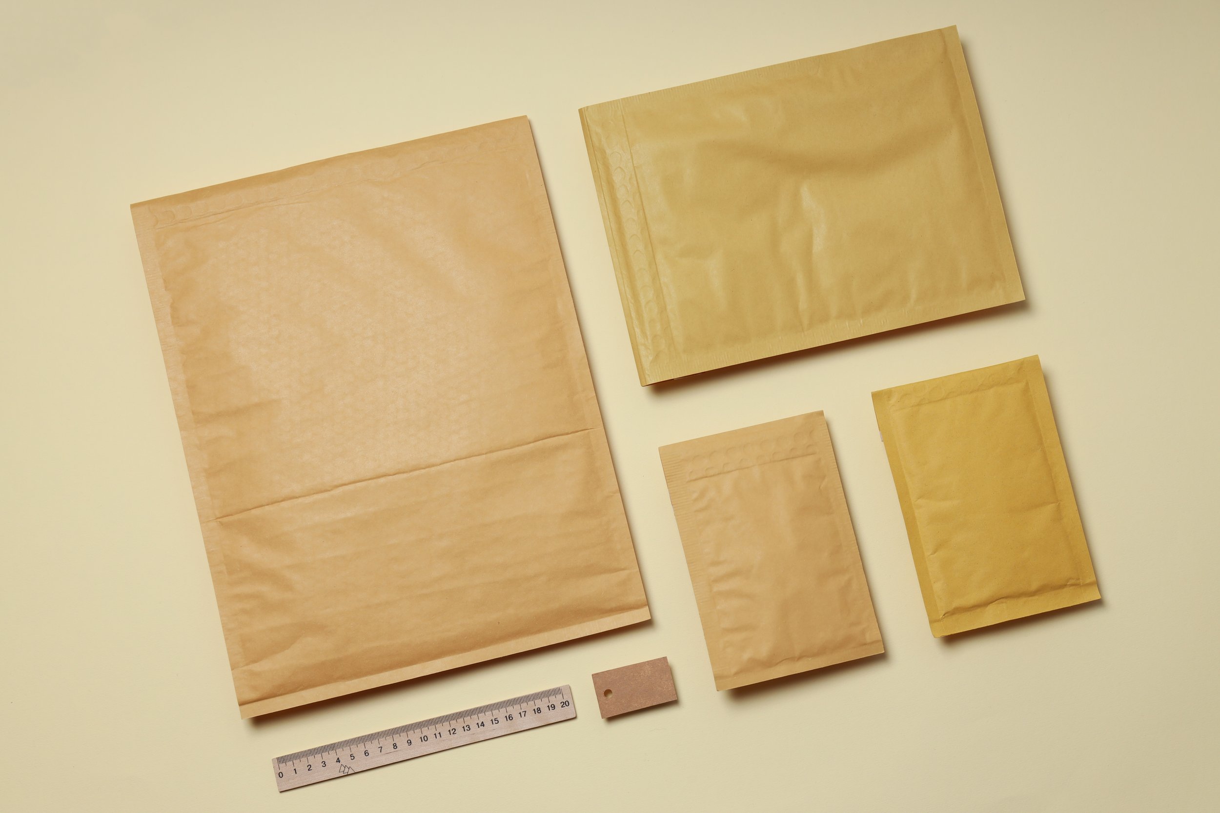 flat-lay-with-blank-packages-on-beige-background-2025-03-24-19-48-25-utc.jpg