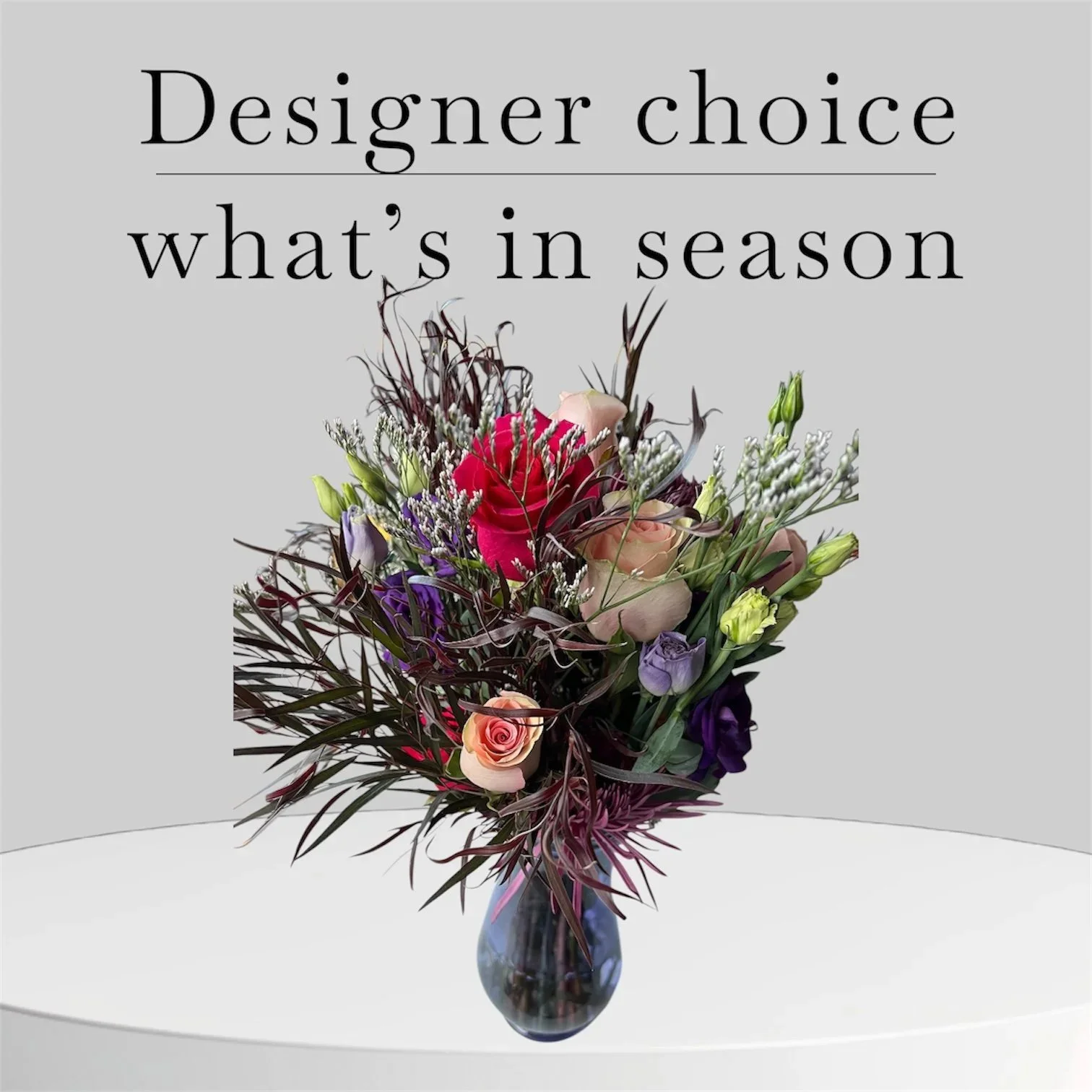 Bouquet whats in season in a designer vase starting @ $65.00 Can match with other pieces