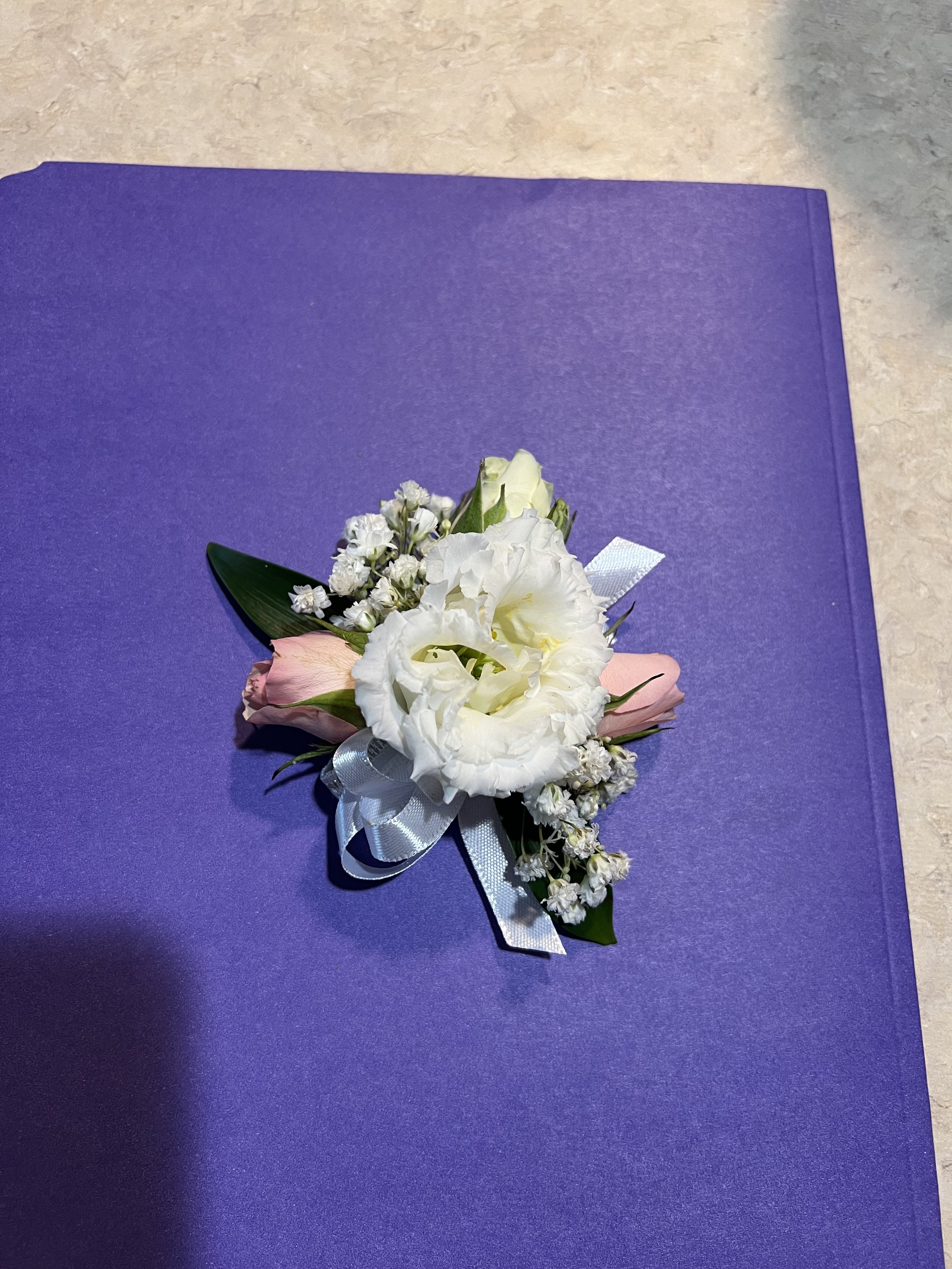 Traditional wrist elastic corsage