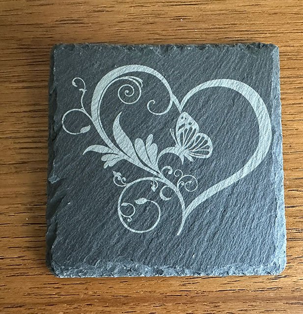 Heart with a butterfly slate coasters