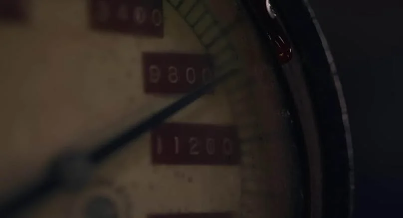 A pressure gauge in the sub, blood is dripping down it.