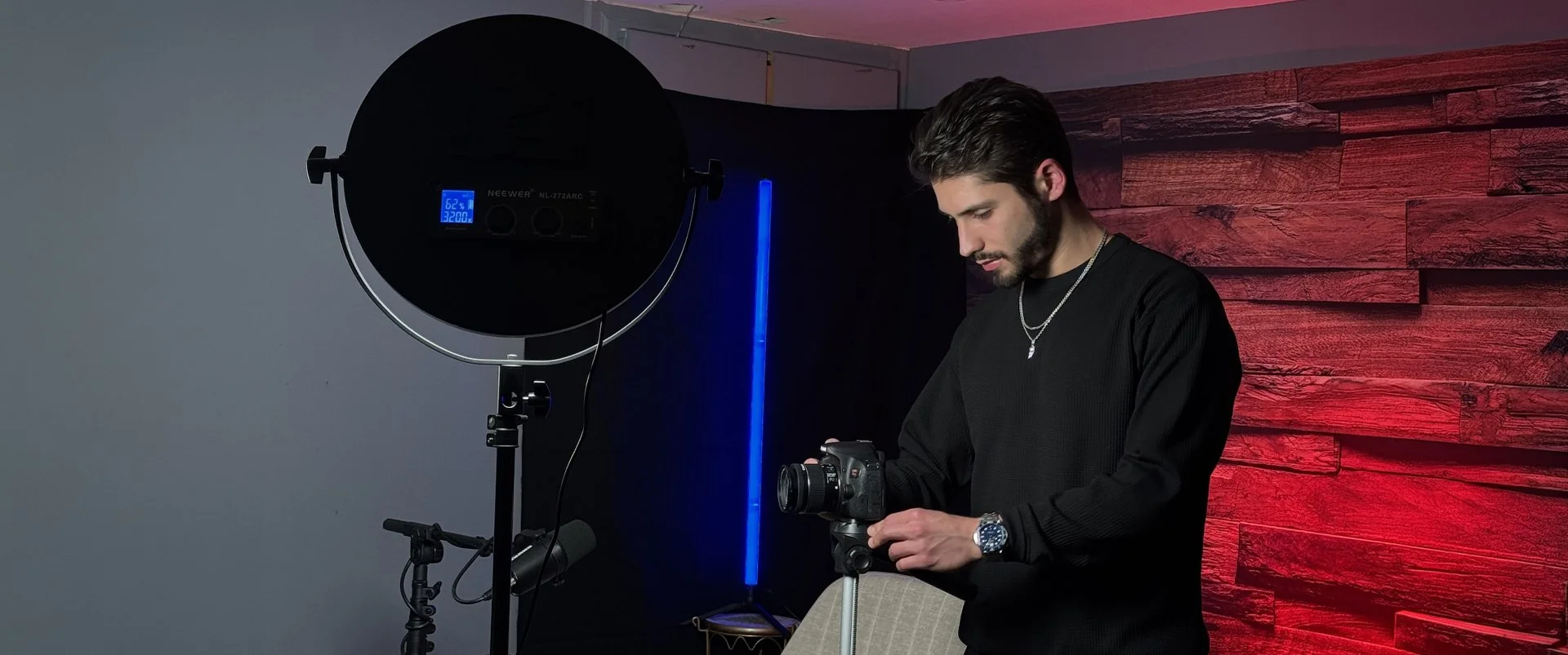 Matt Salesio setting up a founder-led video content shoot in a professional studio