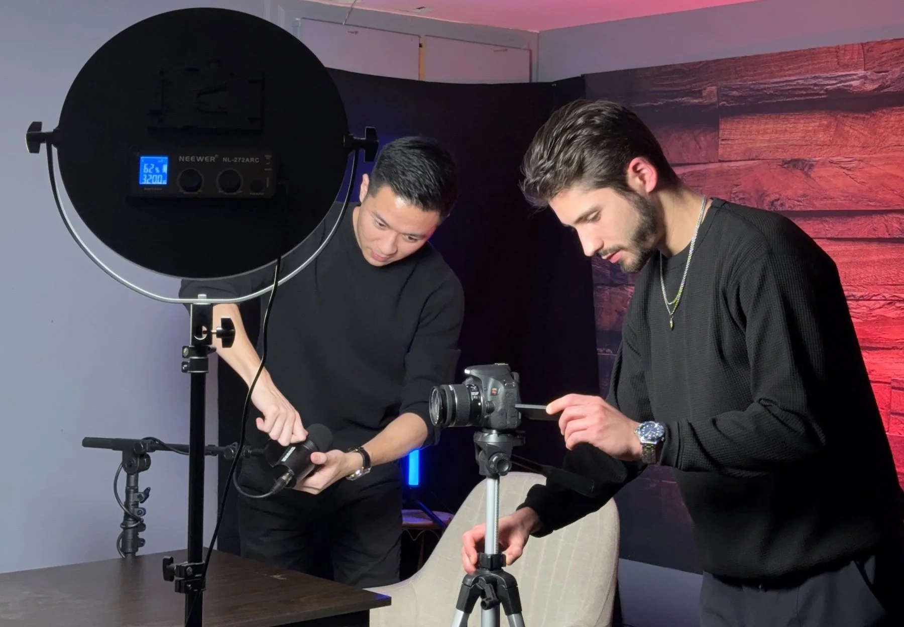 Hyve team setting up a camera and ring light to produce founder-led B2B video content
