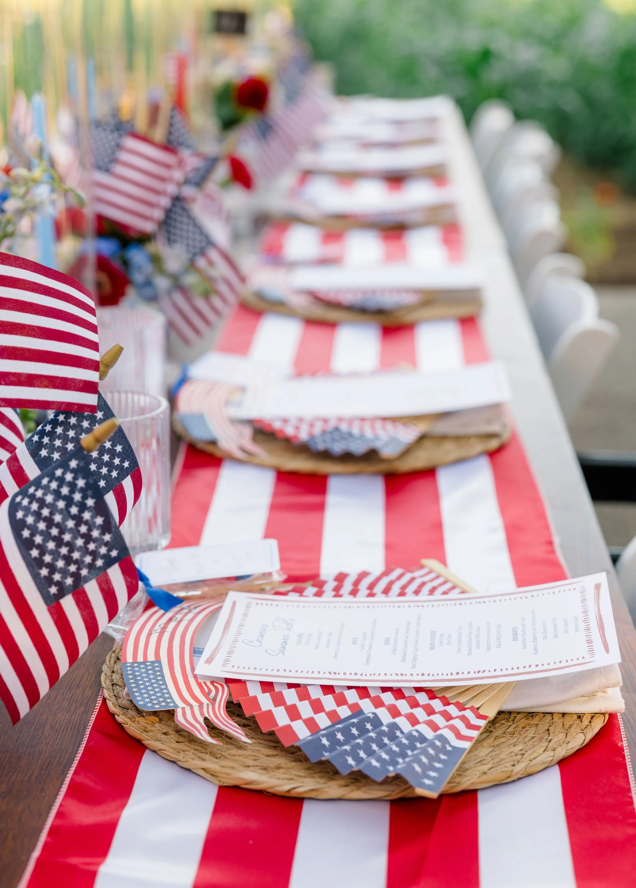 Carmen's Fourth of July Summer Supper at the Greenbrier place settings with flags and fans