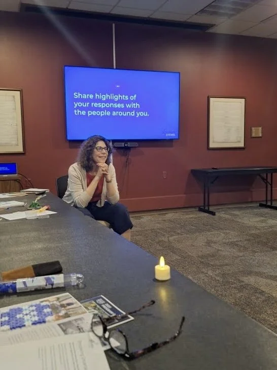 Liz facilitates a large group discussion during a workshop for managing uncertainty. Photo credit: JeraiLyn Jones.