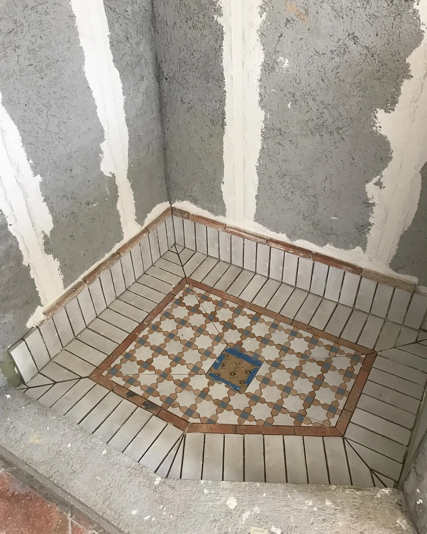 Shower pan coming along nicely #morrocan tiles and #zelig 
@tilesofezra @conceptstudioinc