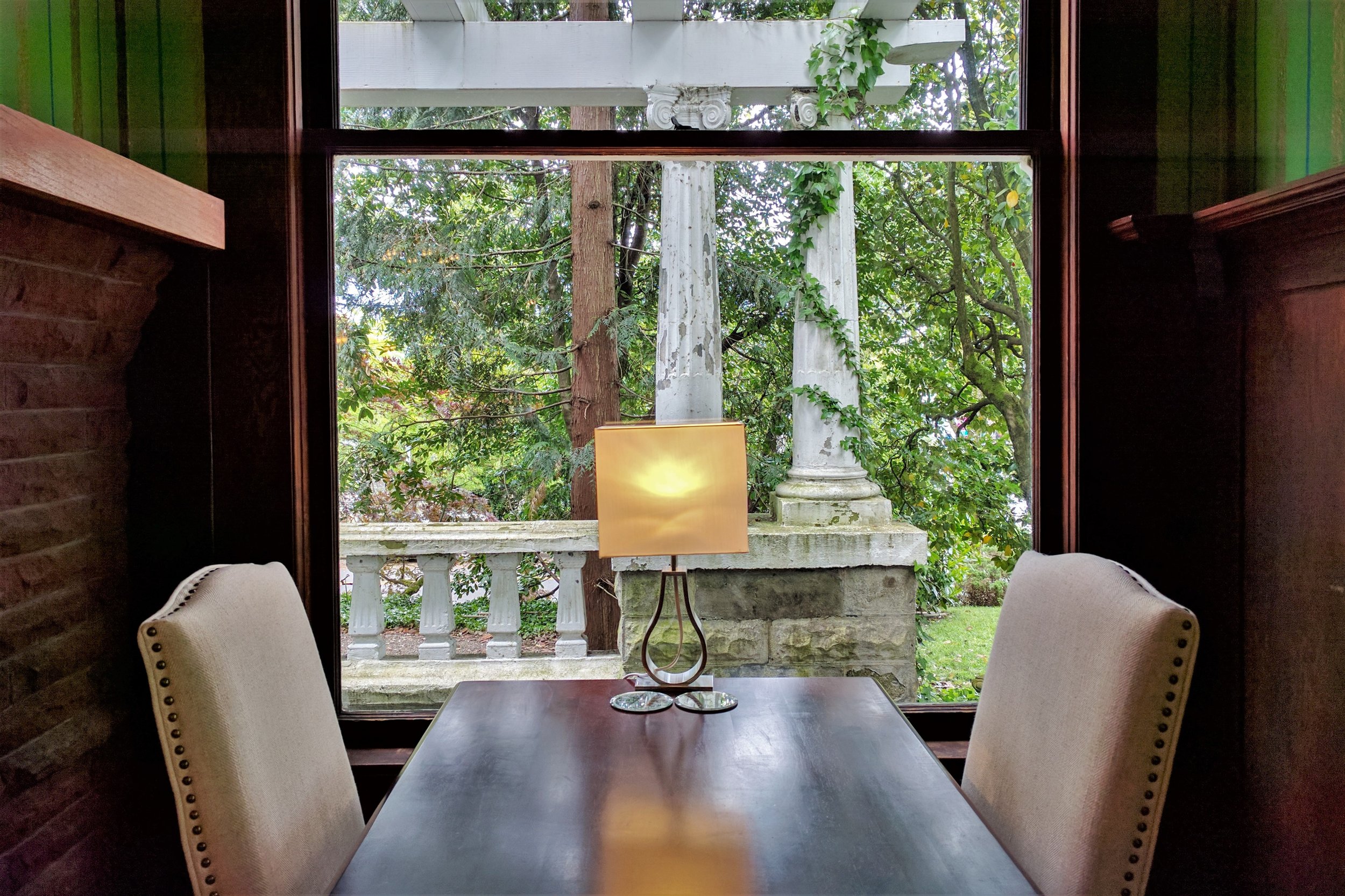 Evermore fireplace room table with view.jpg