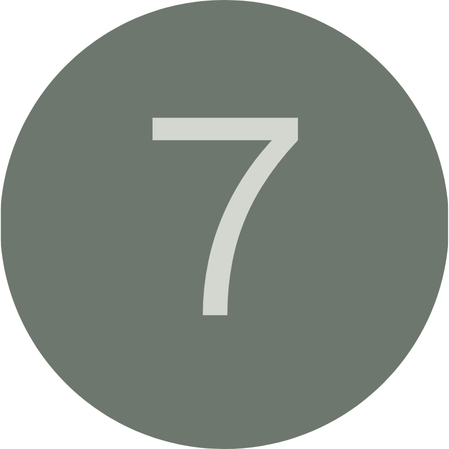 A gray circle with a white number 7 in the center.