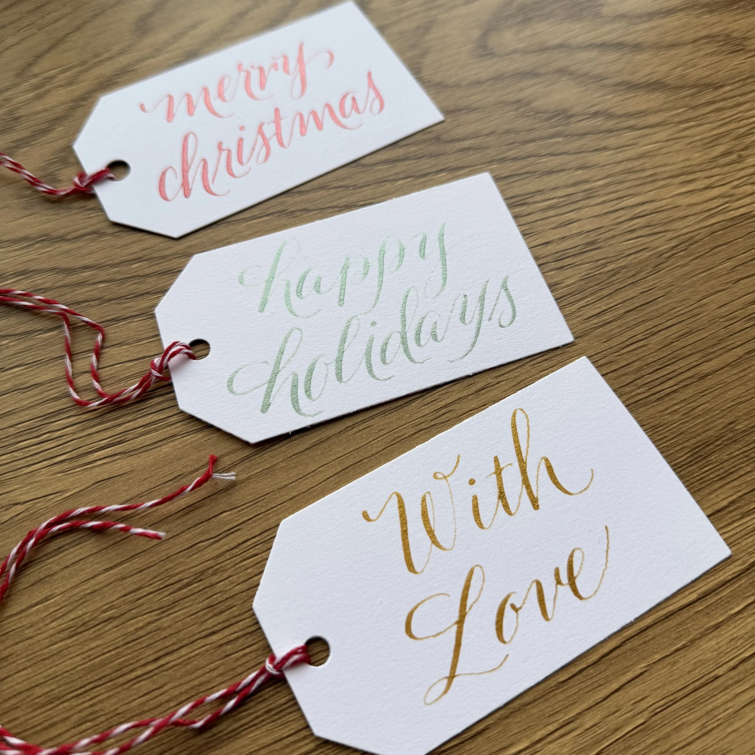 Cosmic Flourish Holiday Gift Tags Calligraphy 2.jpeg
