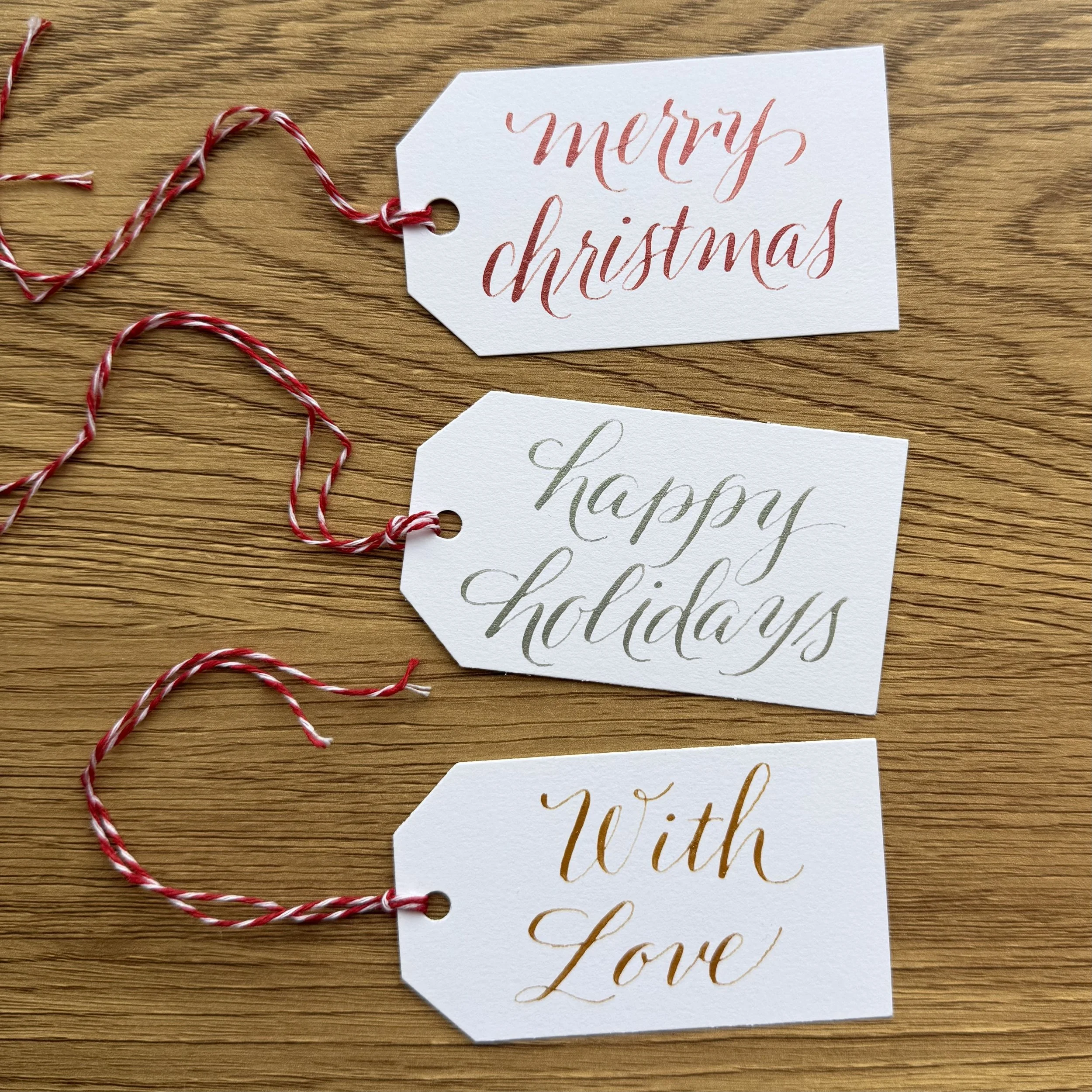 Cosmic Flourish Holiday Gift Tags Calligraphy 1.jpeg