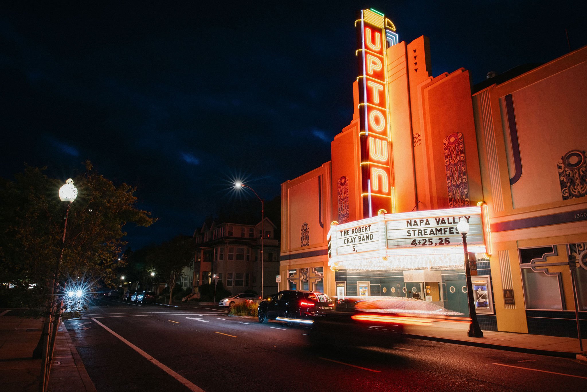 Dark theater where everyone is watching a film
