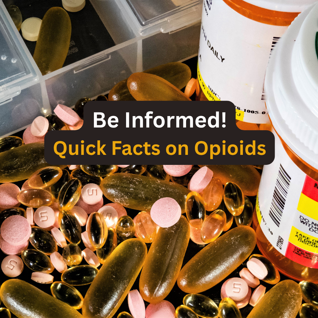 Close-up of various prescription pill bottles and loose pills of different colors and shapes, including pink, black, and yellow capsules, some with '5' inscribed, scattered around.