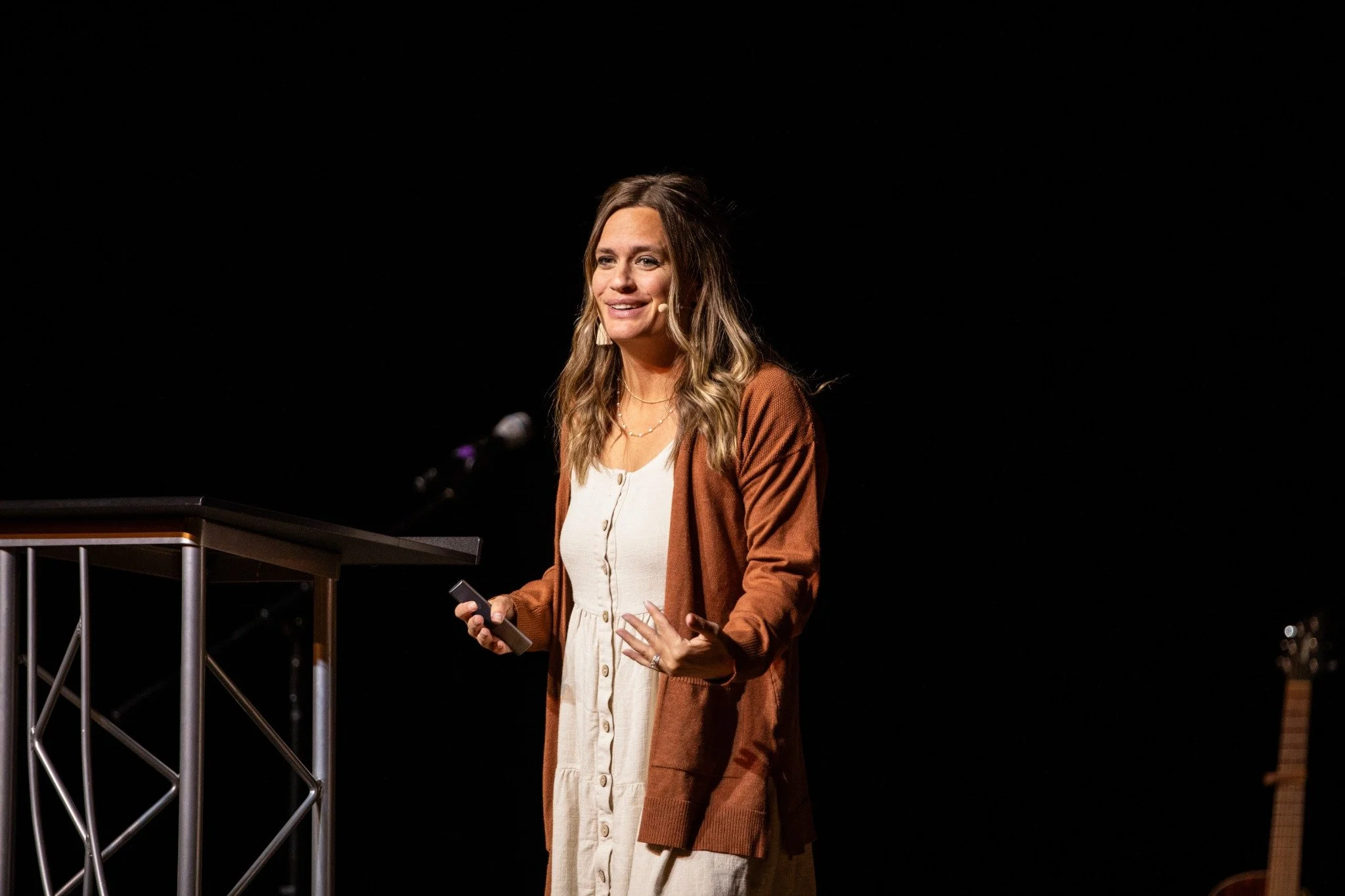 Tera Lind speaking on stage